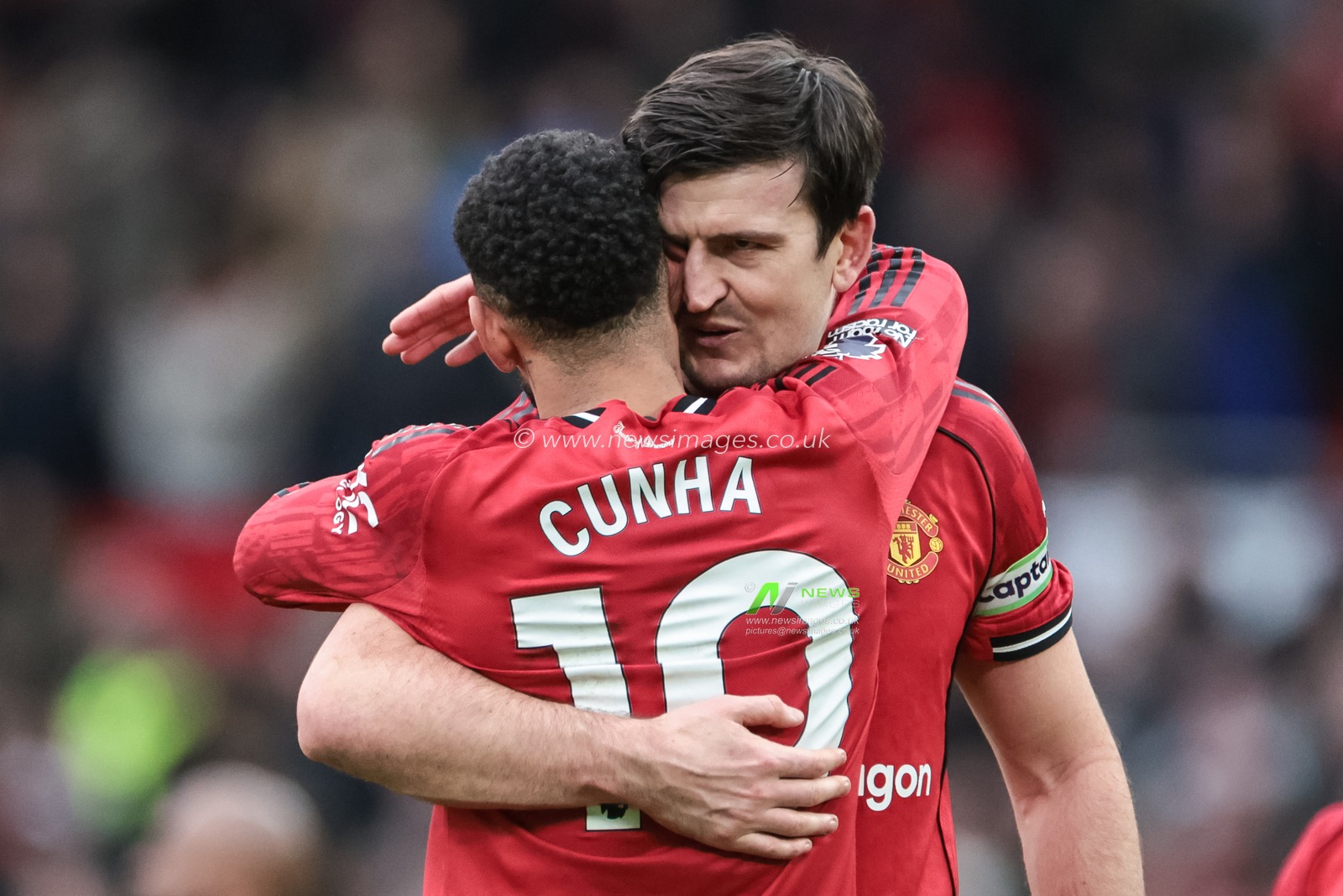 Harry Maguire of Manchester United embraces Matheus Cunha of Manchester United after the final whistle during the Premier League match Manchester United vs Manchester City at Old Trafford, Manchester, United Kingdom, 17th January 2026

(Photo by Mark Cosgrove/News Images)