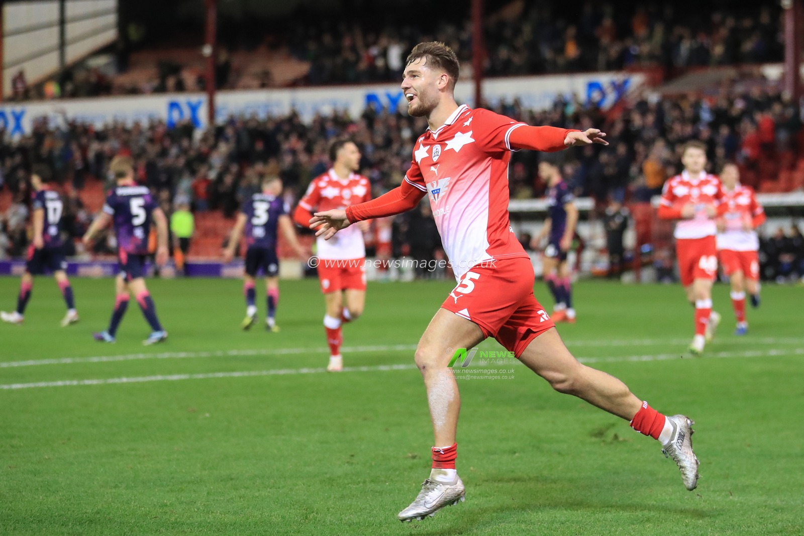 John Mcatee #45 of Barnsley celebrates his goal to make it 1-1 during the Sky Bet League 1 match Barnsley vs Stevenage at Oakwell, Barnsley, United Kingdom, 23rd December 2023

(Photo by Alfie Cosgrove/News Images)