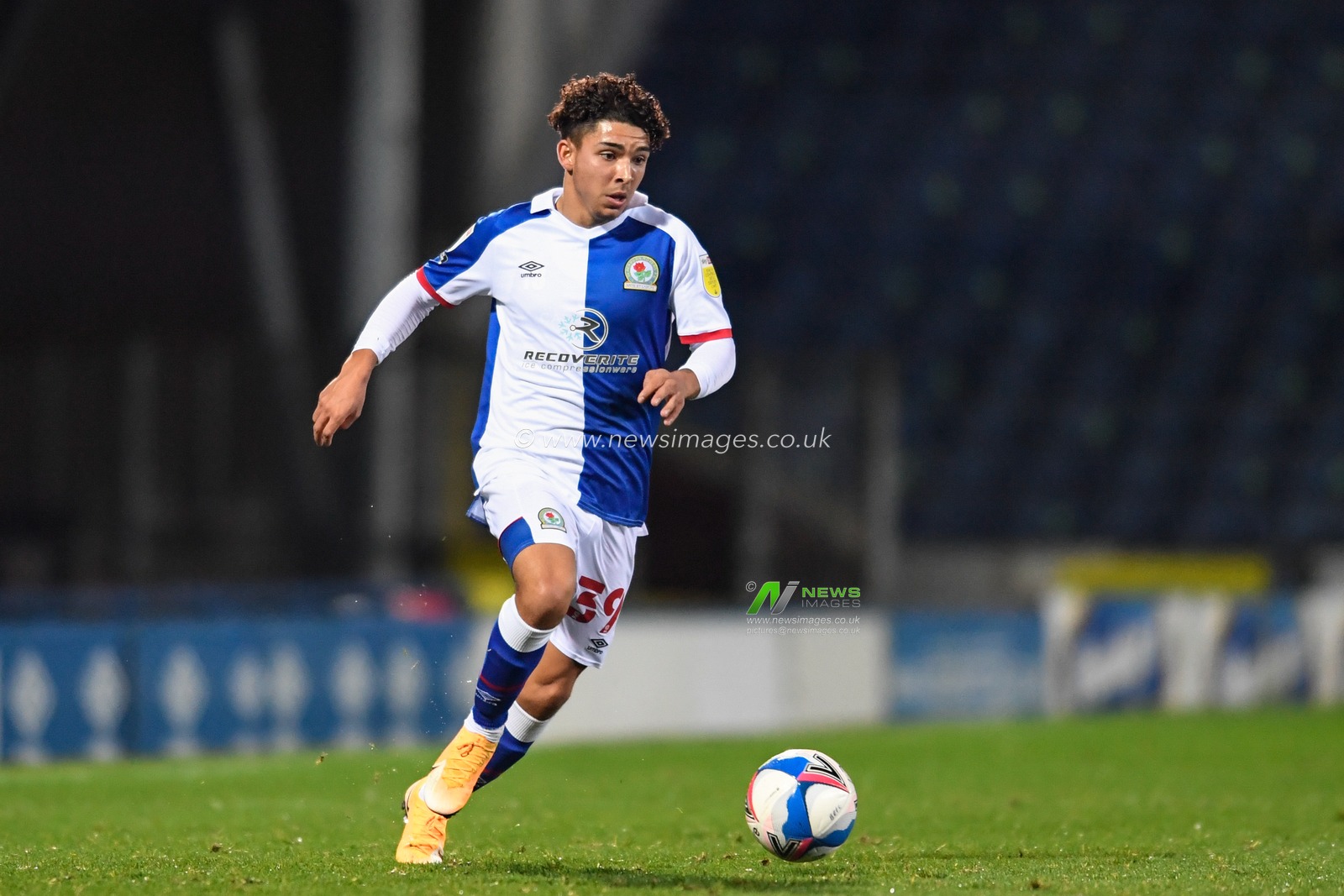 Tyrhys Dolan #39 of Blackburn Rovers runs forward with the ball
