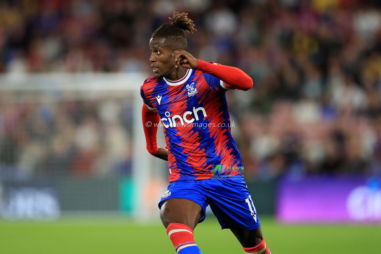 Wilfried Zaha #11 of Crystal Palace in action.