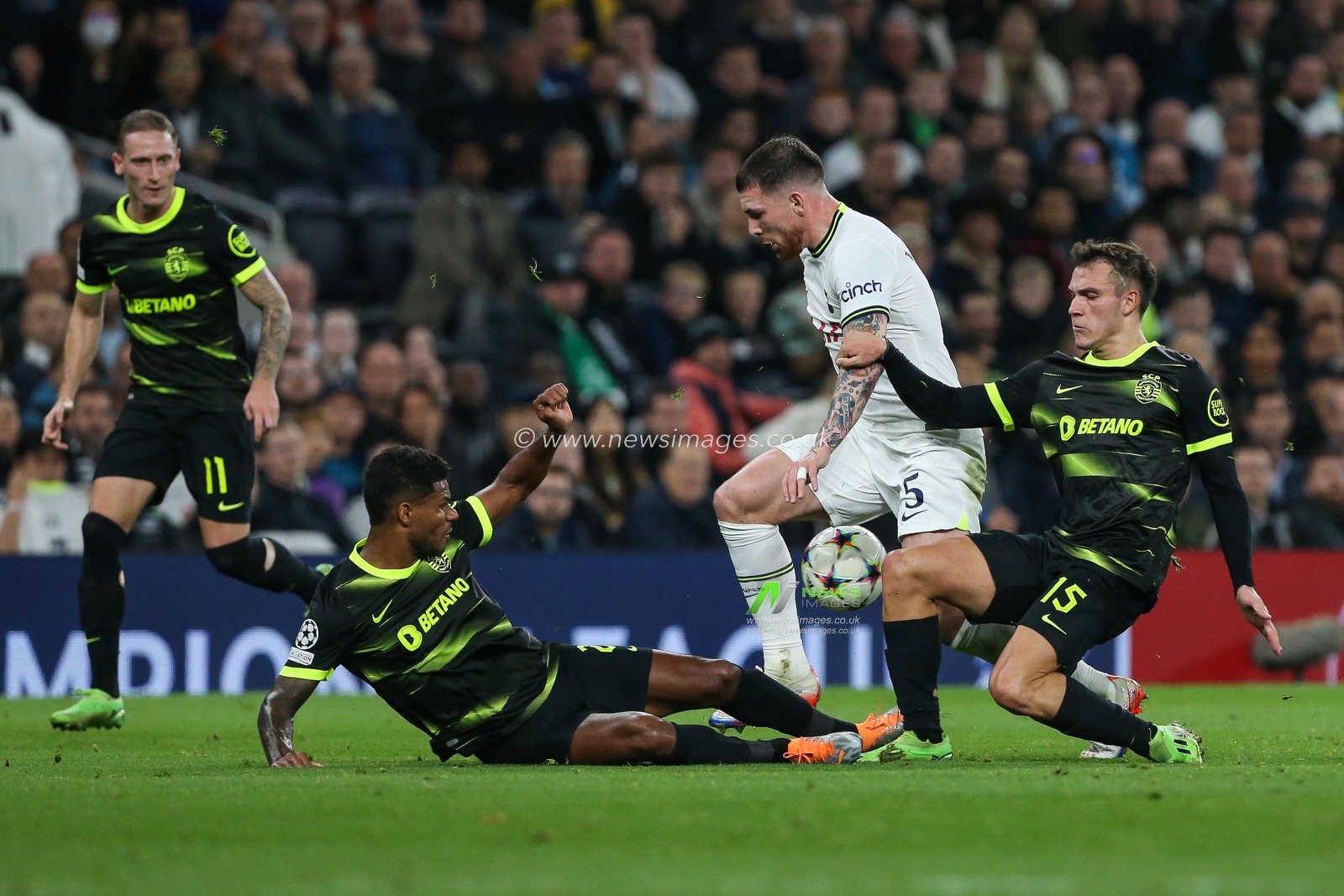 Pierre-Emile HÃ¸jbjerg #5 of Tottenham Hotspur is tackled by Manuel Ugarte #15 of Sporting Lisbon during the UEFA Champions League match Tottenham Hotspur vs Sporting Lisbon at Tottenham Hotspur Stadium, London, United Kingdom, 26th October 2022

(Photo by Arron Gent/News Images)