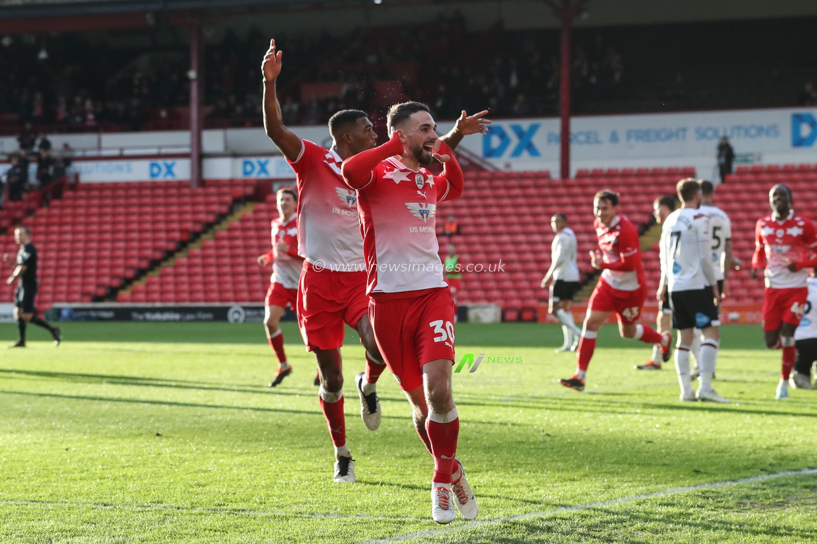 Adam Phillips of Barnsley celebrates his goal to make it 2-1 during the Sky Bet League 1 match Barnsley vs Derby County at Oakwell, Barnsley, United Kingdom, 24th February 2024

(Photo by Alfie Cosgrove/News Images)