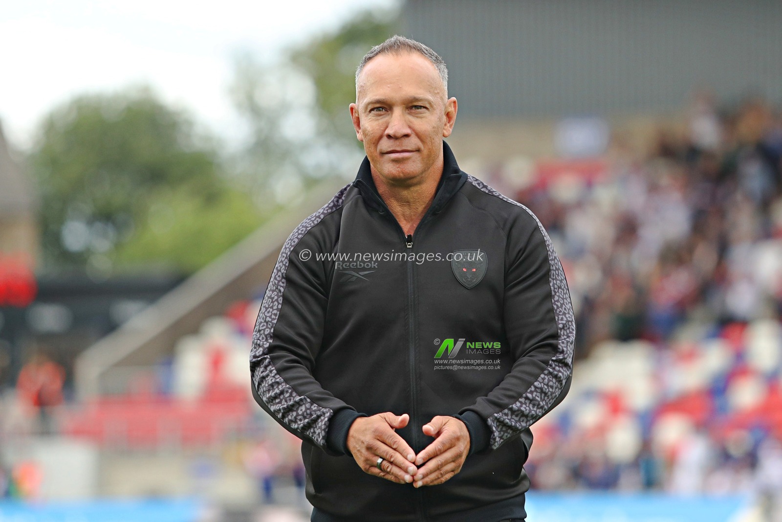 Adrian Lam, Head Coach of Leigh Leopards applauds the fans after the Betfred Super League Round 14 match Wakefield Trinity vs Leigh Leopards at DIY Kitchens Stadium, Wakefield, United Kingdom, 15th June 2025(Photo by Sam Eaden/News Images)