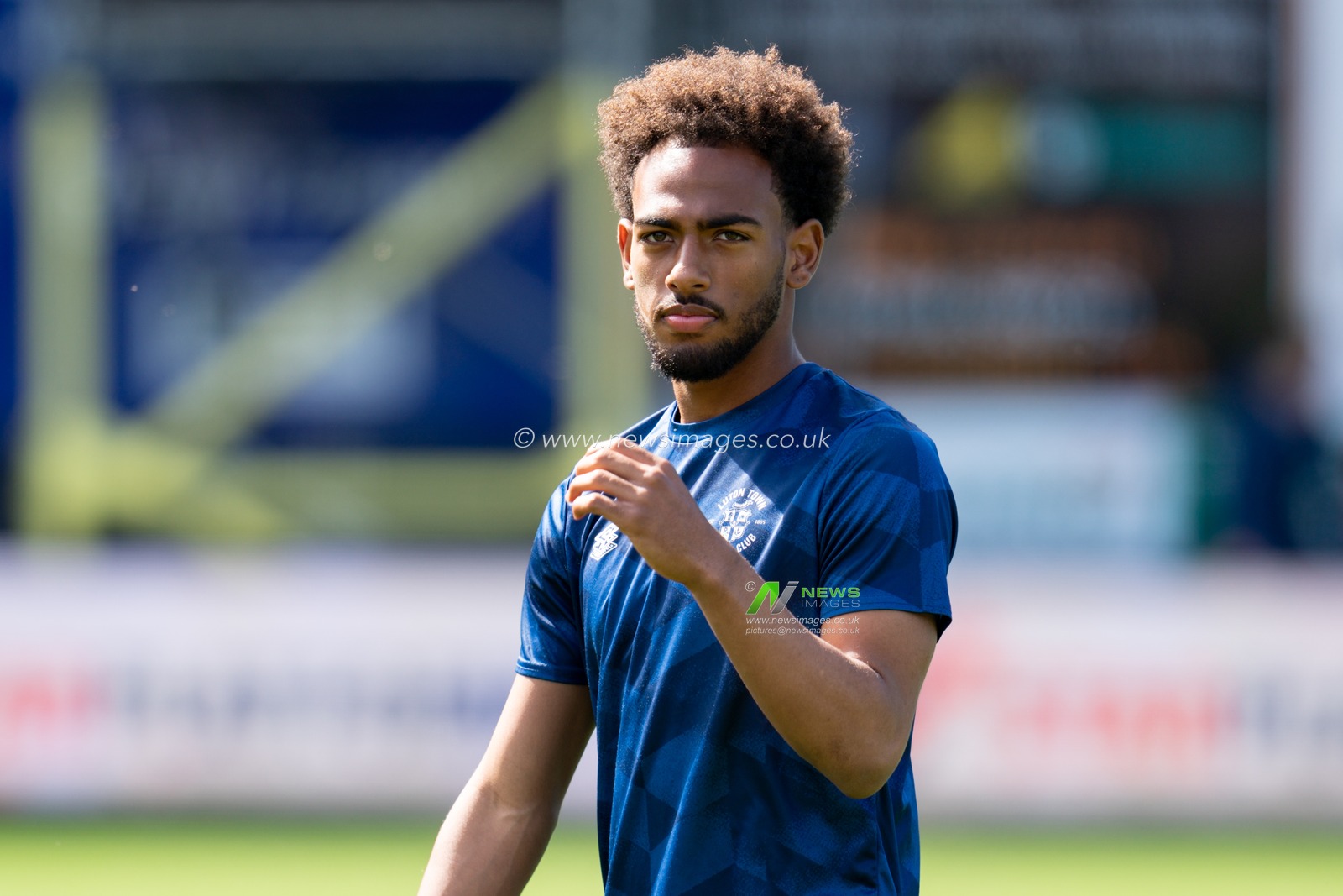 Tyrelle Newton #39 of Luton Town warming up