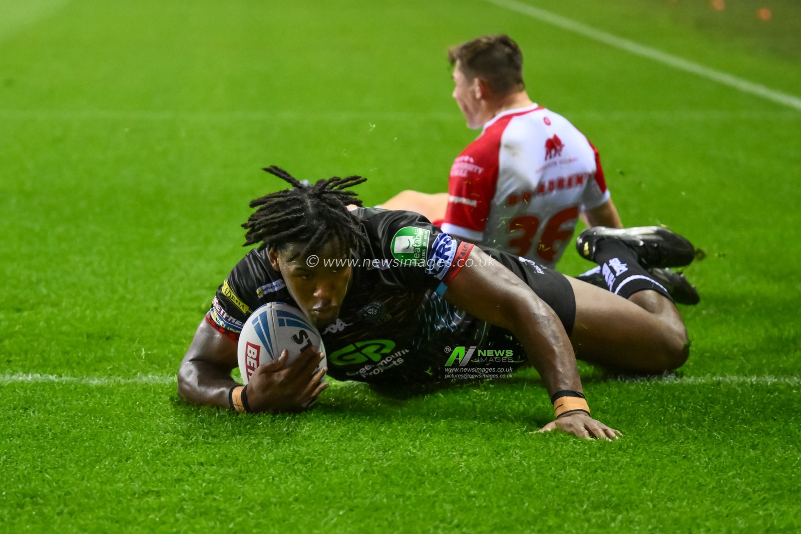 Junior Nsemba of Wigan Warriors goes over for a try during the Betfred Super League Round 25 match Wigan Warriors vs Hull KR at The Brick Community Stadium, Wigan, United Kingdom, 6th September 2024

(Photo by Craig Thomas/News Images)