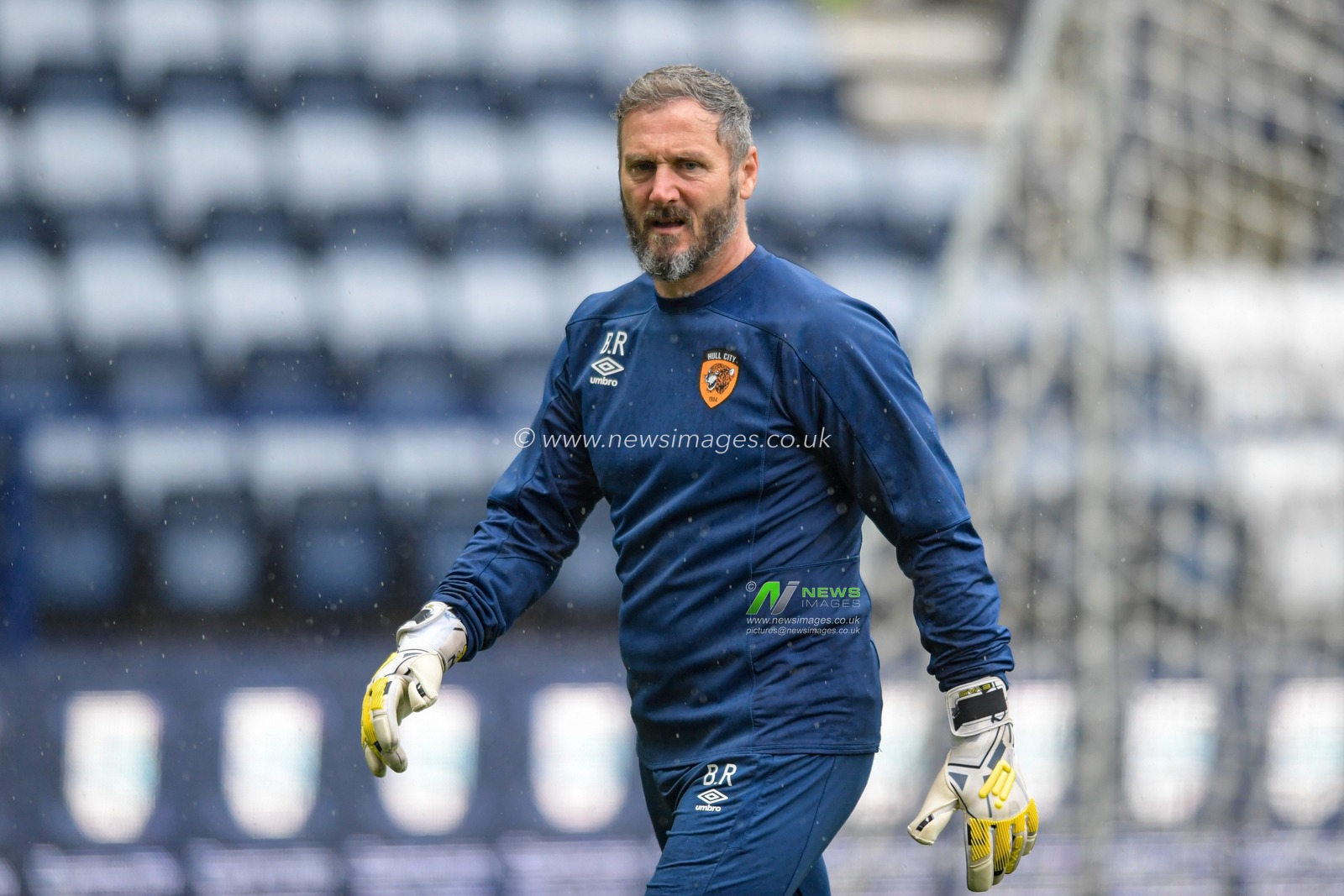 Barry Richardson goalkeeping coach of Hull City leads the warm up