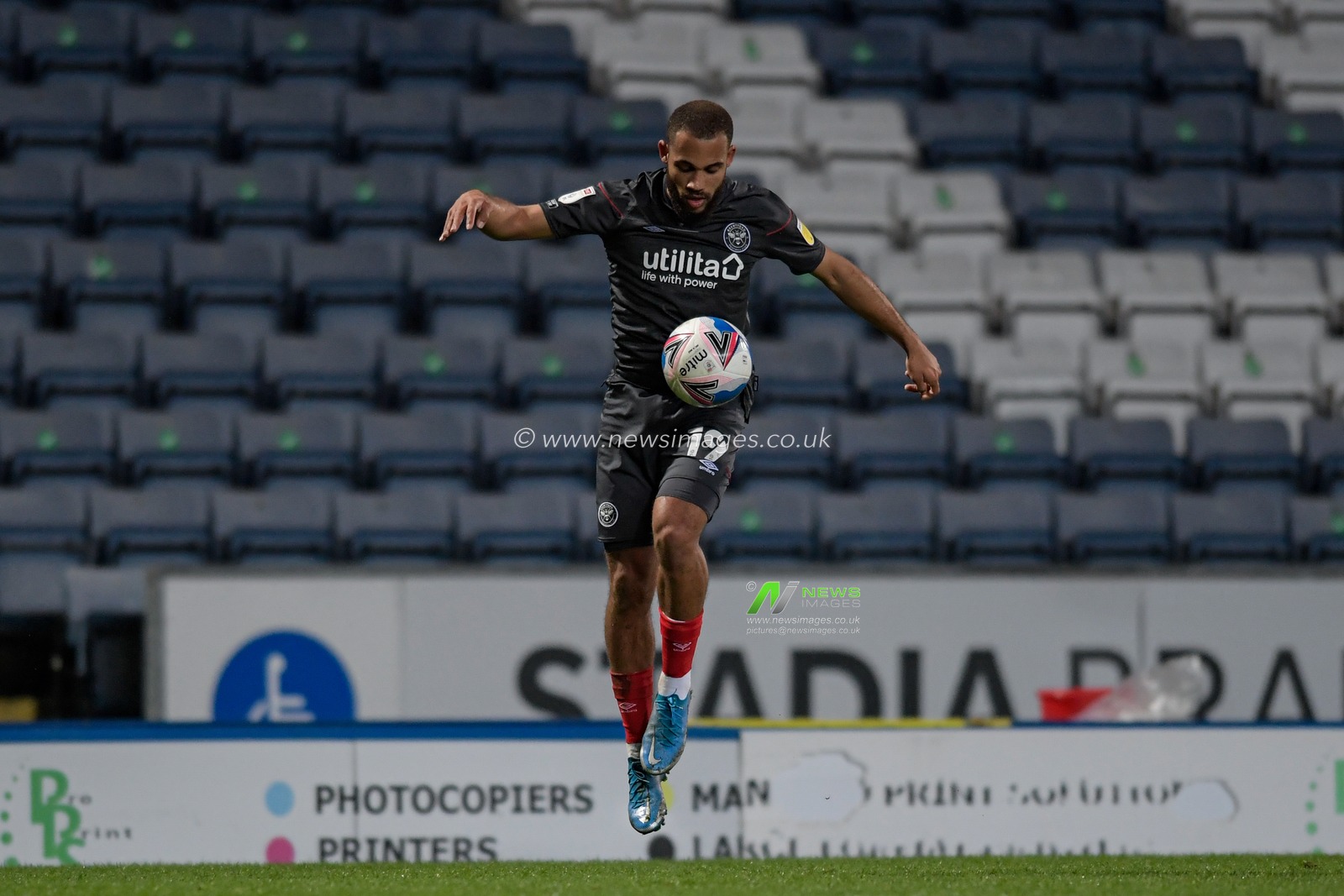 Bryan Mbeumo #19 of Brentford controls the ball