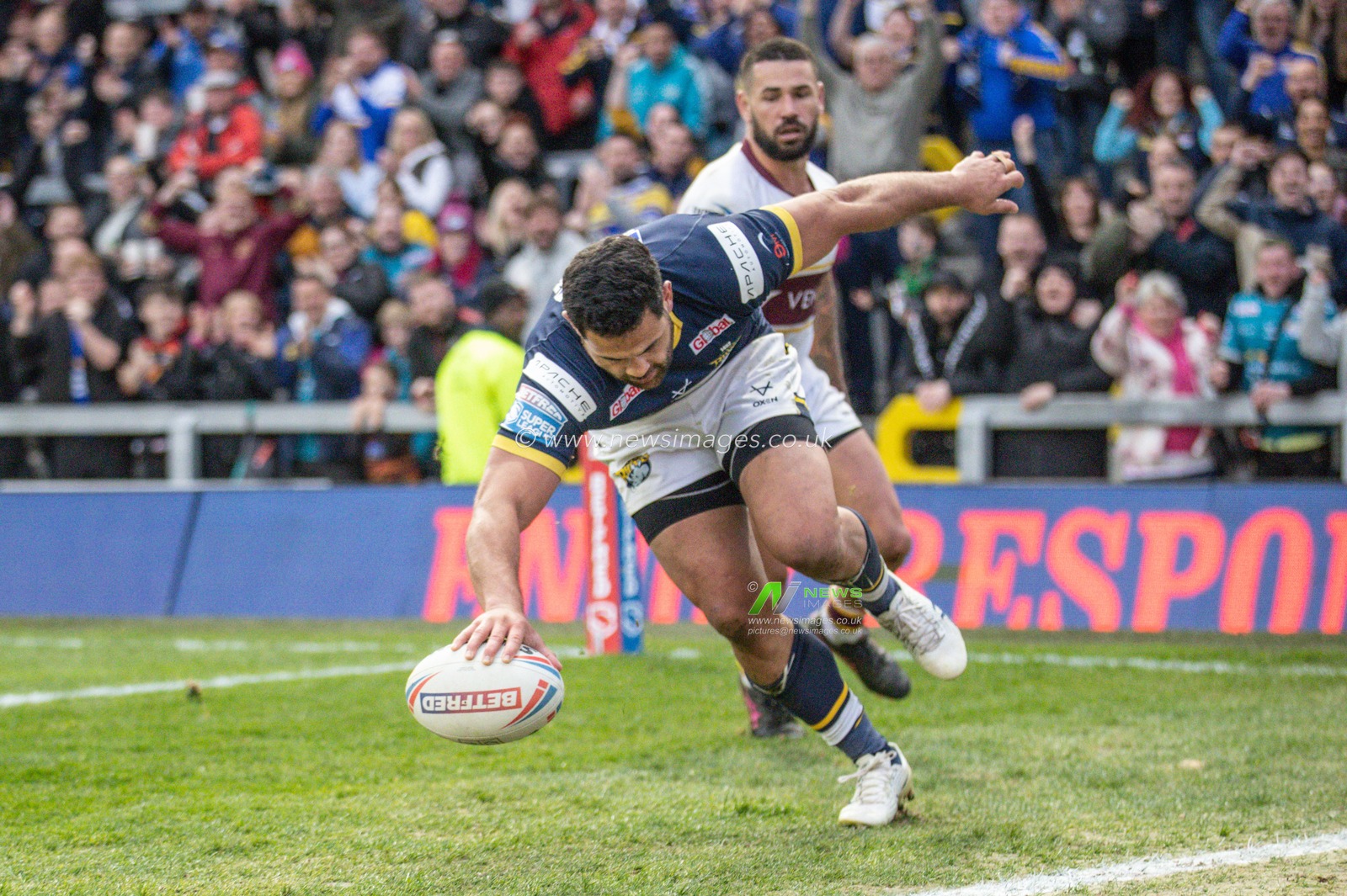 Rhyse Martin #12 of Leeds Rhinos goes over for a try during the Betfred Super League Round 8 match Leeds Rhinos vs Huddersfield Giants at Headingley Stadium, Leeds, United Kingdom, 9th April 2023

(Photo by Mark Cosgrove/News Images)