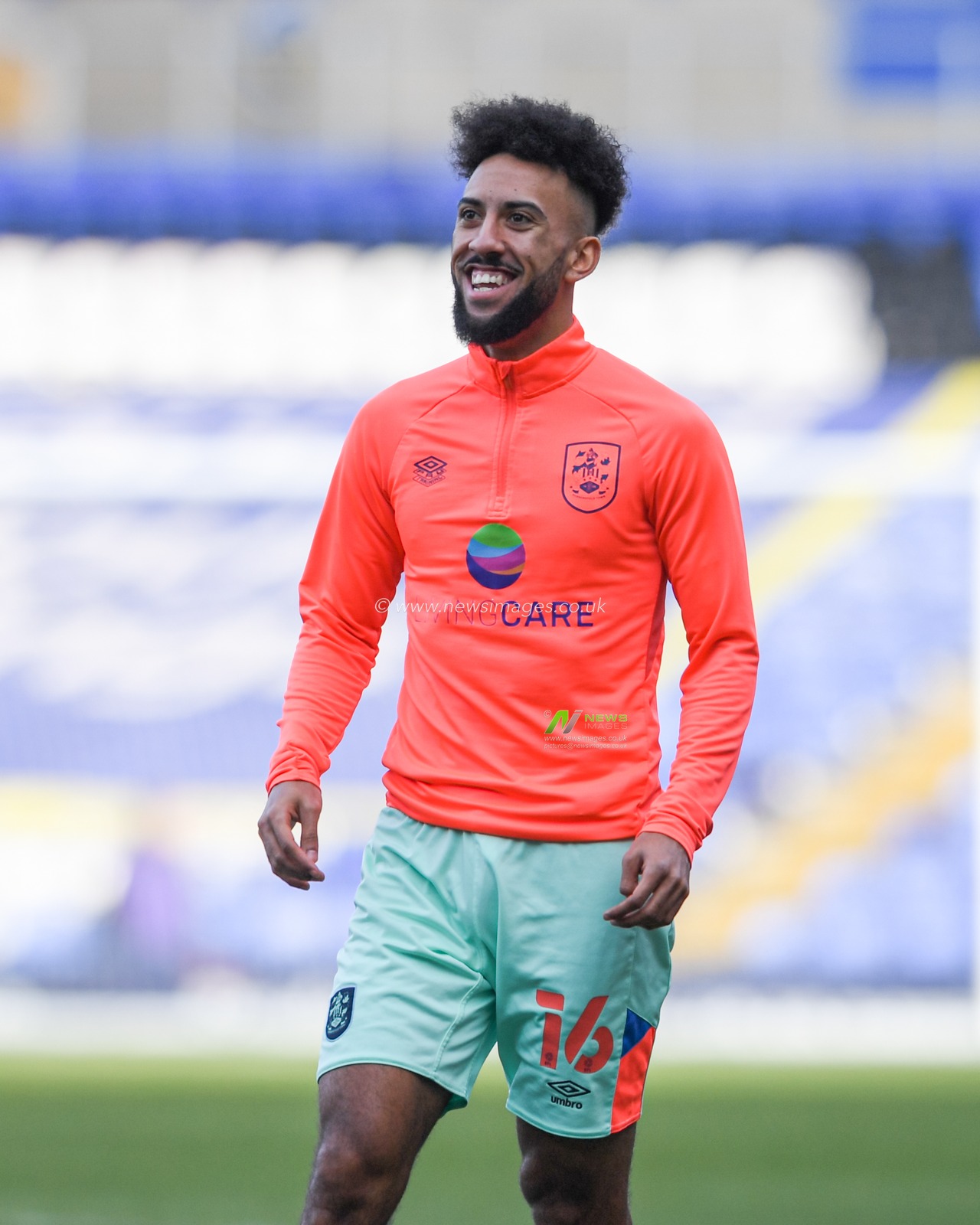 Sorba Thomas #16 of Huddersfield Town warming up before the game