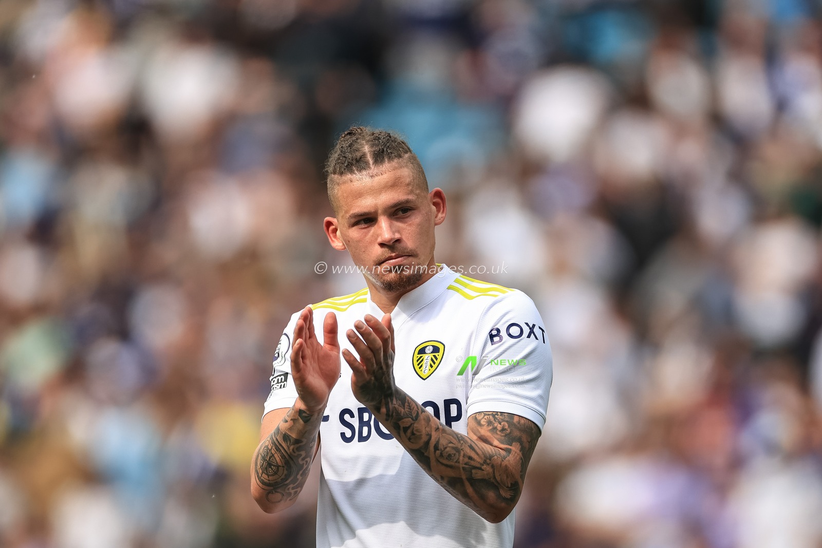 Kalvin Phillips #23 of Leeds United applauds the fans after United draw 1-1