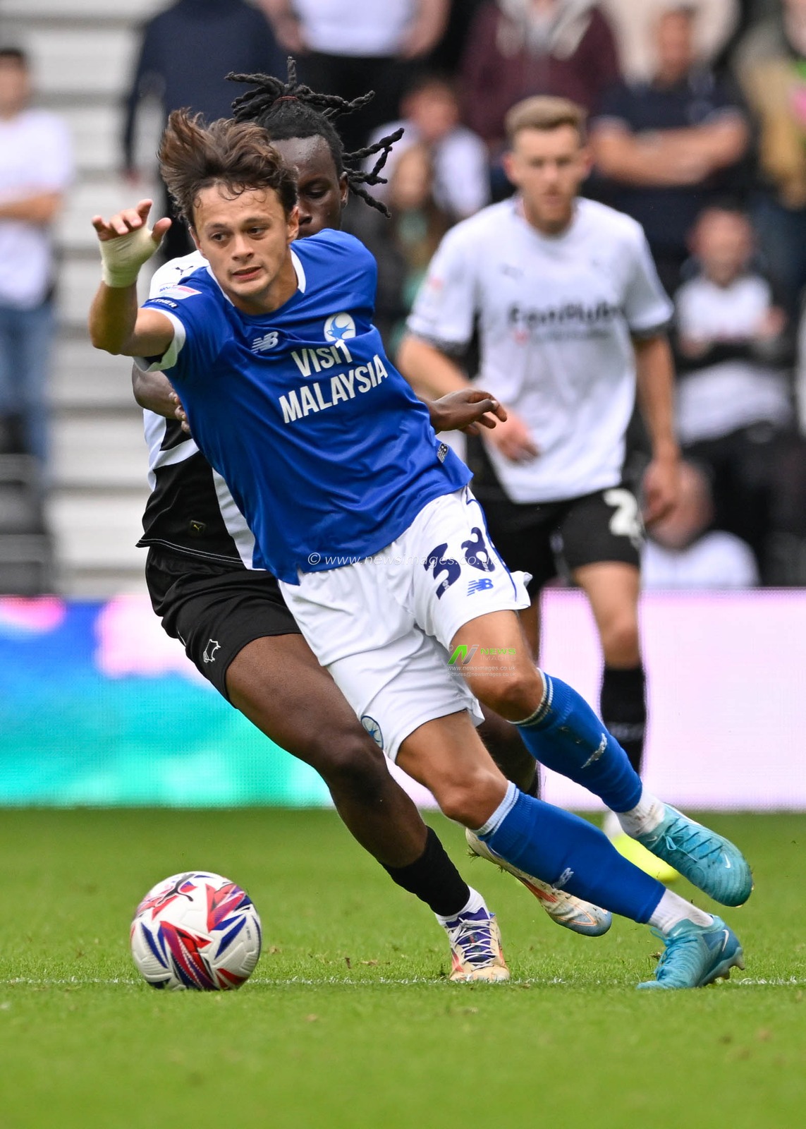 Perry Ng (Cardiff City) attacking with the ball during the Sky Bet Championship match Derby County vs Cardiff City at Pride Park Stadium, Derby, United Kingdom, 14th September 2024

(Photo by Mark Dunn/News Images)