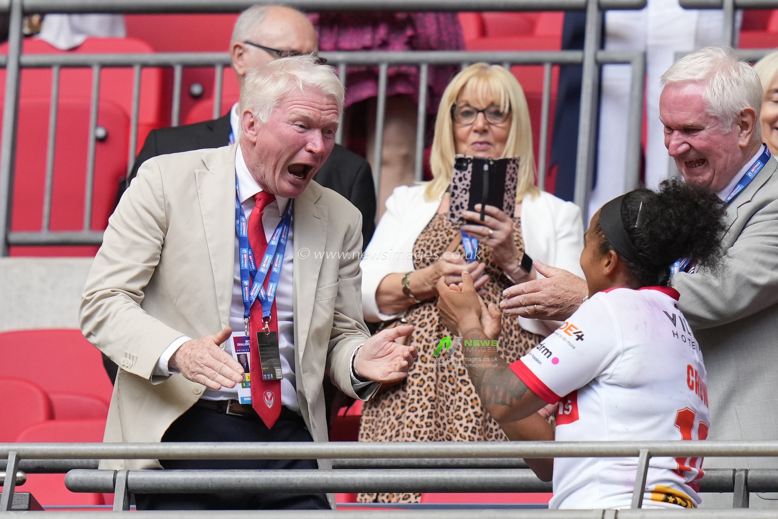 Eamonn McManus, owner of St. Helens RLFC greets Chantelle Crowl #10 of St. Helens after the Betfred Womens Challenge Cup Final match Leeds Rhinos vs St Helens at Wembley Stadium, London, United Kingdom, 12th August 2023

(Photo by Steve Flynn/News Images)