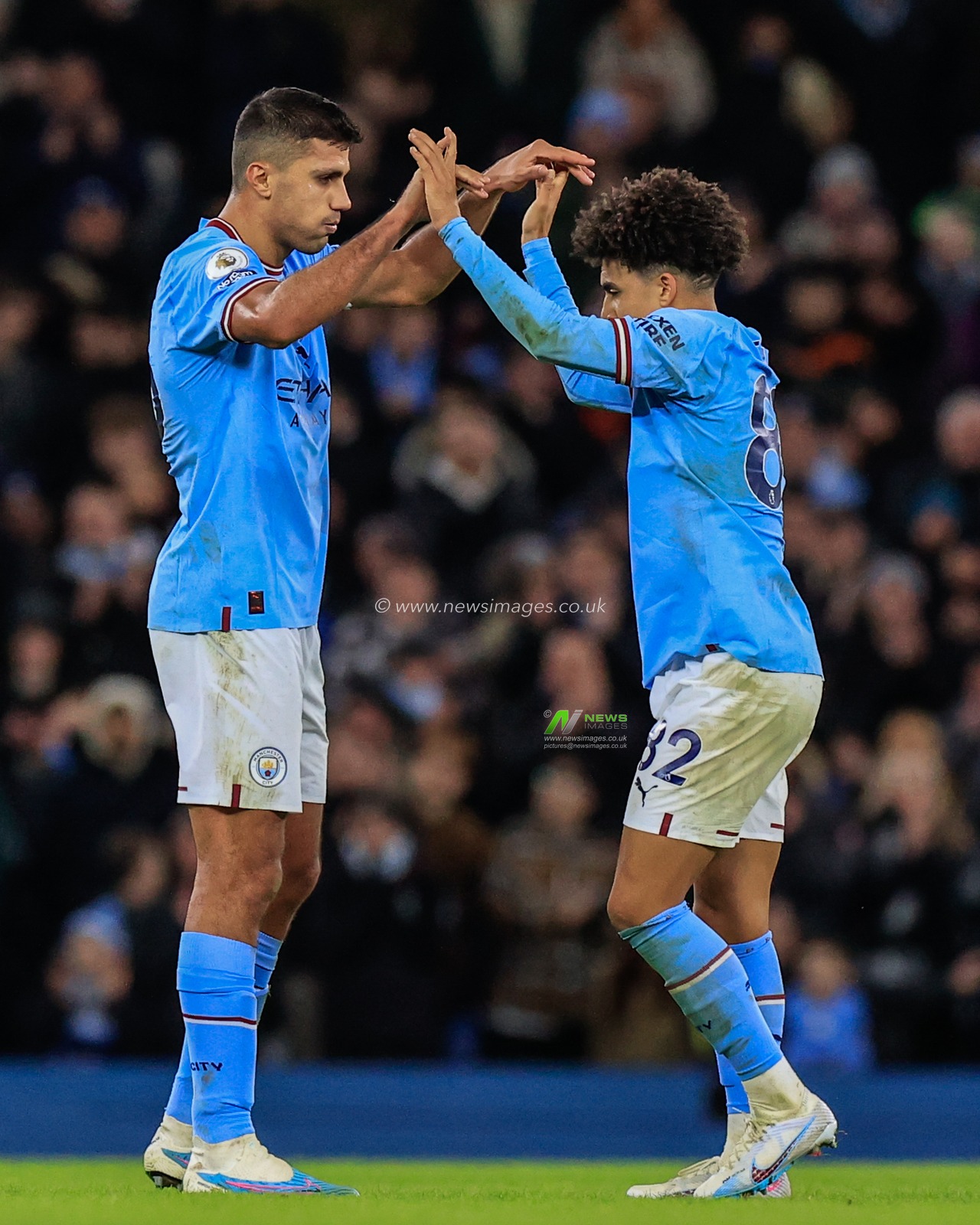 Rodri #16 of Manchester City acknowledges Rico Lewis #82 of Manchester City  as heâ€™s substituted during the Premier League match Manchester City vs Tottenham Hotspur at Etihad Stadium, Manchester, United Kingdom, 19th January 2023

(Photo by Conor Molloy/News Images)