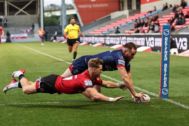 Joe Burgess of Hull KR goes over for a try during the Betfred Super League Round 20 Salford Red Devils vs Hull KR at Salford Community Stadium, Eccles, United Kingdom, 31st July 2025

(Photo by Mark Cosgrove/News Images)