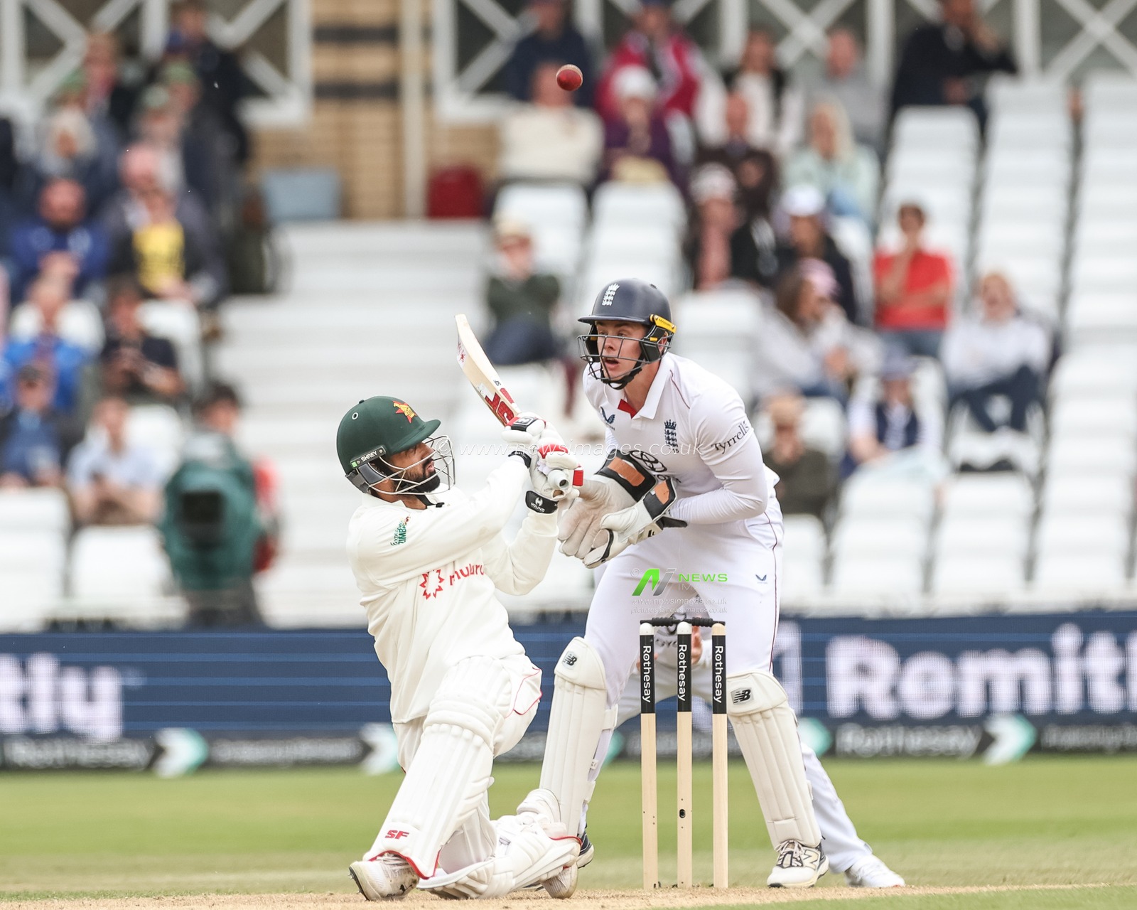 Sikandar Raza of Zimbabwe hooks the ball over the head of Jamie Smith of England to go to the boundary for four runs during the Rothesay Test Match Day 3 England vs Zimbabwe at Trent Bridge, Nottingham, United Kingdom, 24th May 2025

(Photo by Mark Cosgrove/News Images)