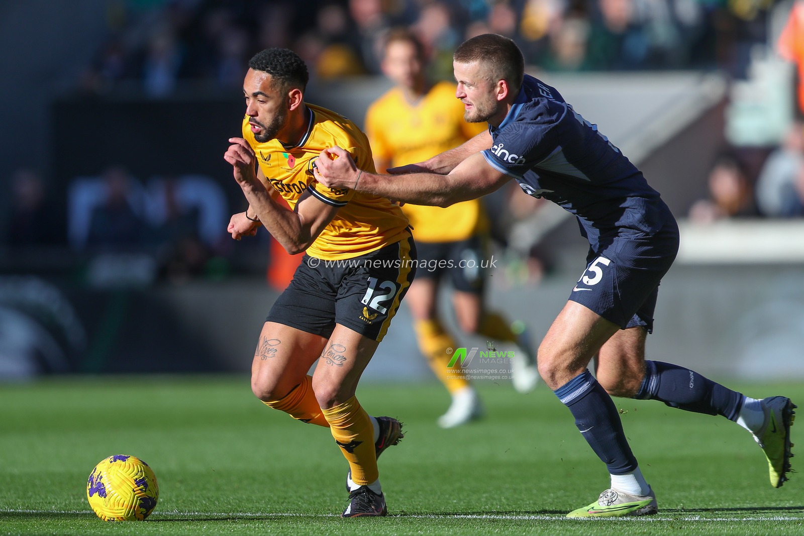 Matheus Cunha #12 of Wolverhampton Wanderers holds off Eric Dier #15 of Tottenham Hotspur during the Premier League match Wolverhampton Wanderers vs Tottenham Hotspur at Molineux, Wolverhampton, United Kingdom, 11th November 2023

(Photo by Gareth Evans/News Images)