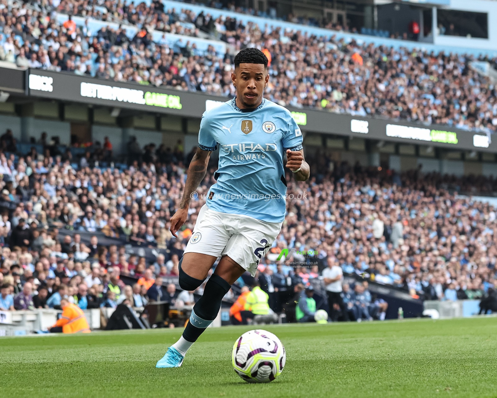 SÃ¡vio of Manchester City with the ball during the Premier League match Manchester City vs Ipswich Town at Etihad Stadium, Manchester, United Kingdom, 24th August 2024

(Photo by Mark Cosgrove/News Images)