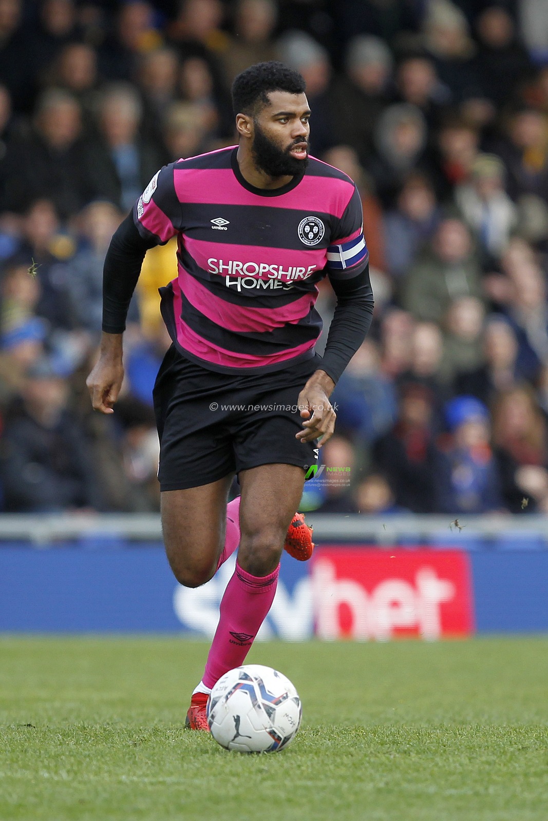 Ethan Ebanks-Landell #4 of Shrewsbury Town on the ball