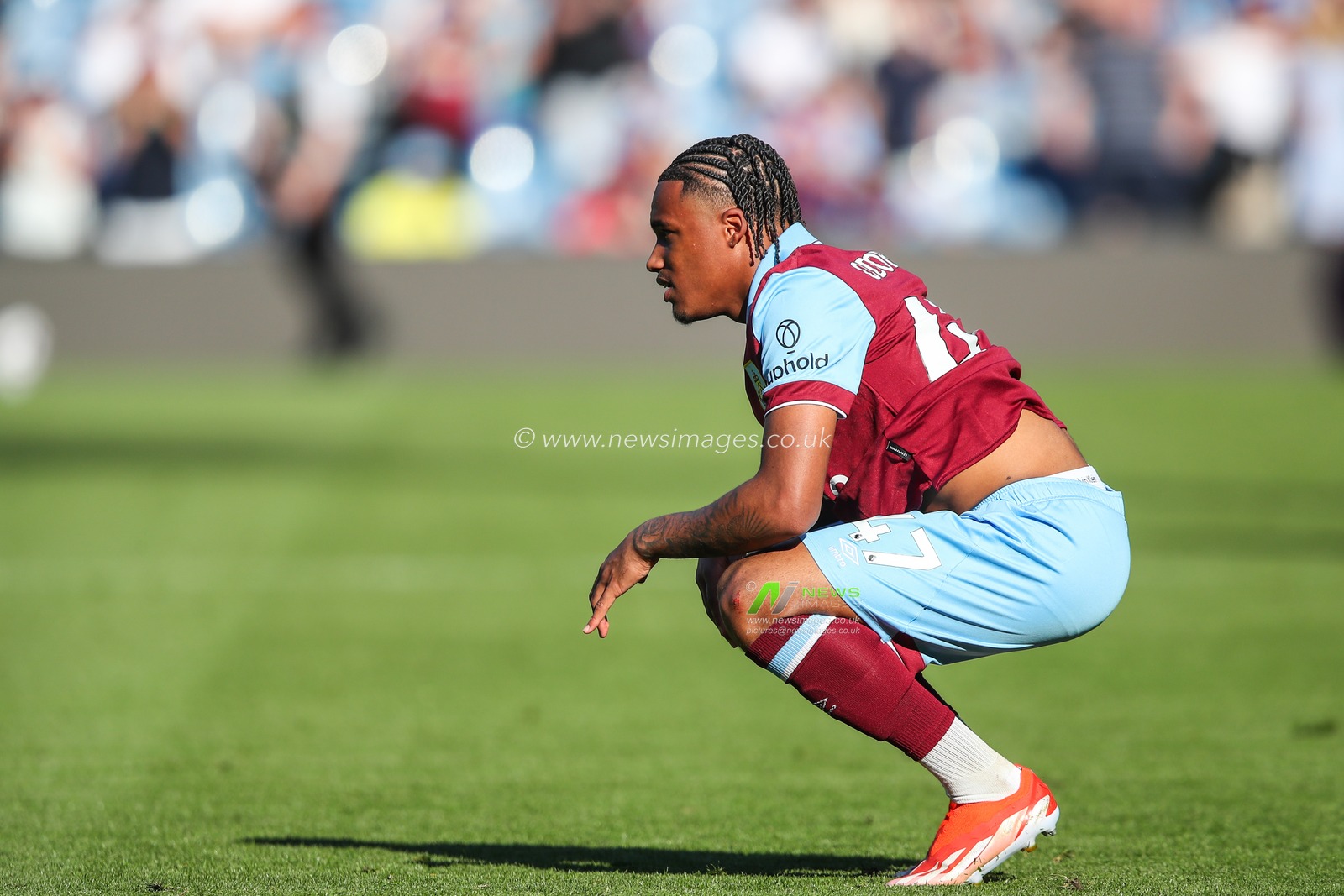 Wilson Odobert of Burnley looks dejected at full time as his side is relegated from the Premier League after the Premier League match Burnley vs Nottingham Forest at Turf Moor, Burnley, United Kingdom, 19th May 2024

(Photo by Gareth Evans/News Images)