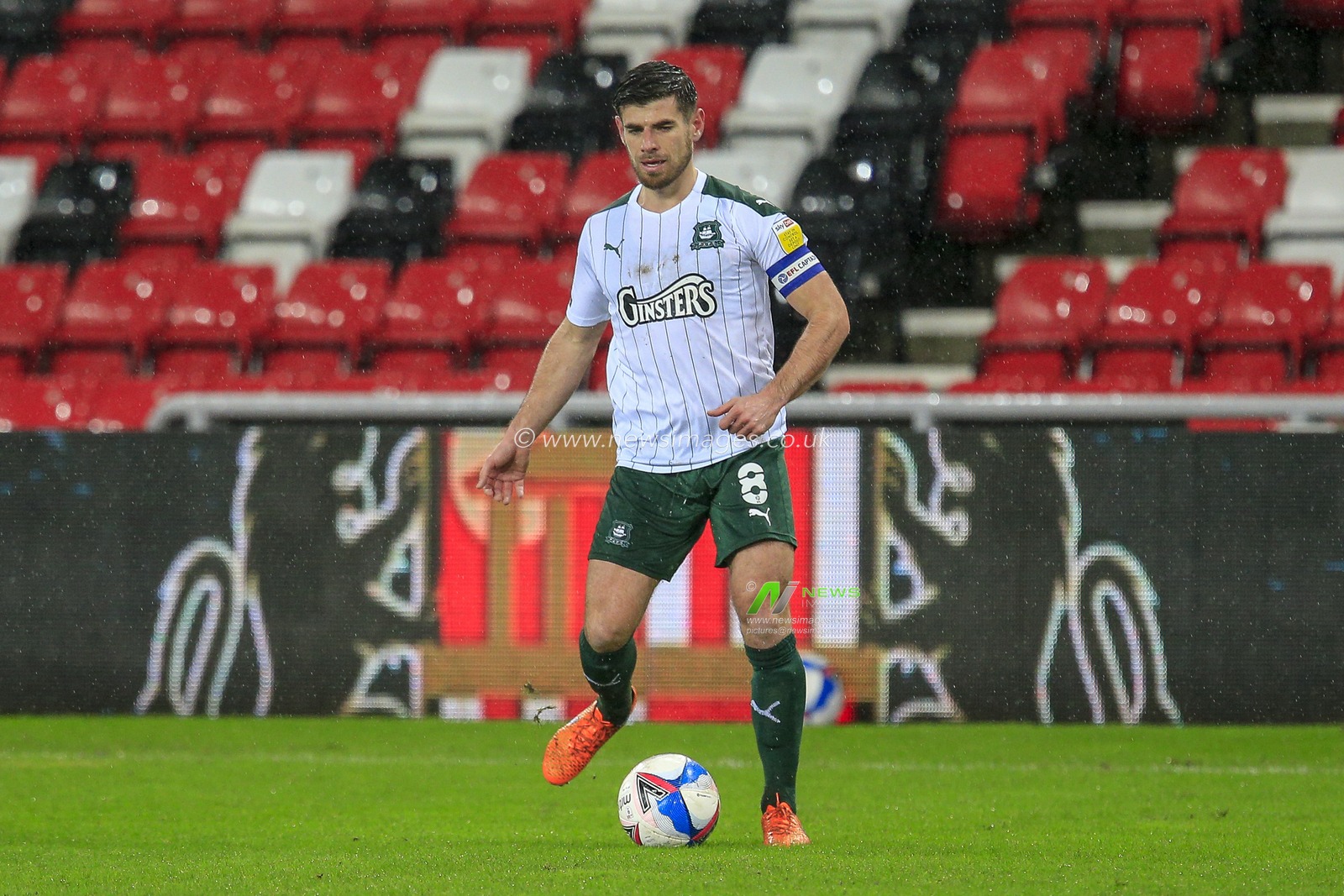 Joe Edwards #8 of Plymouth Argyle in possession of the ball