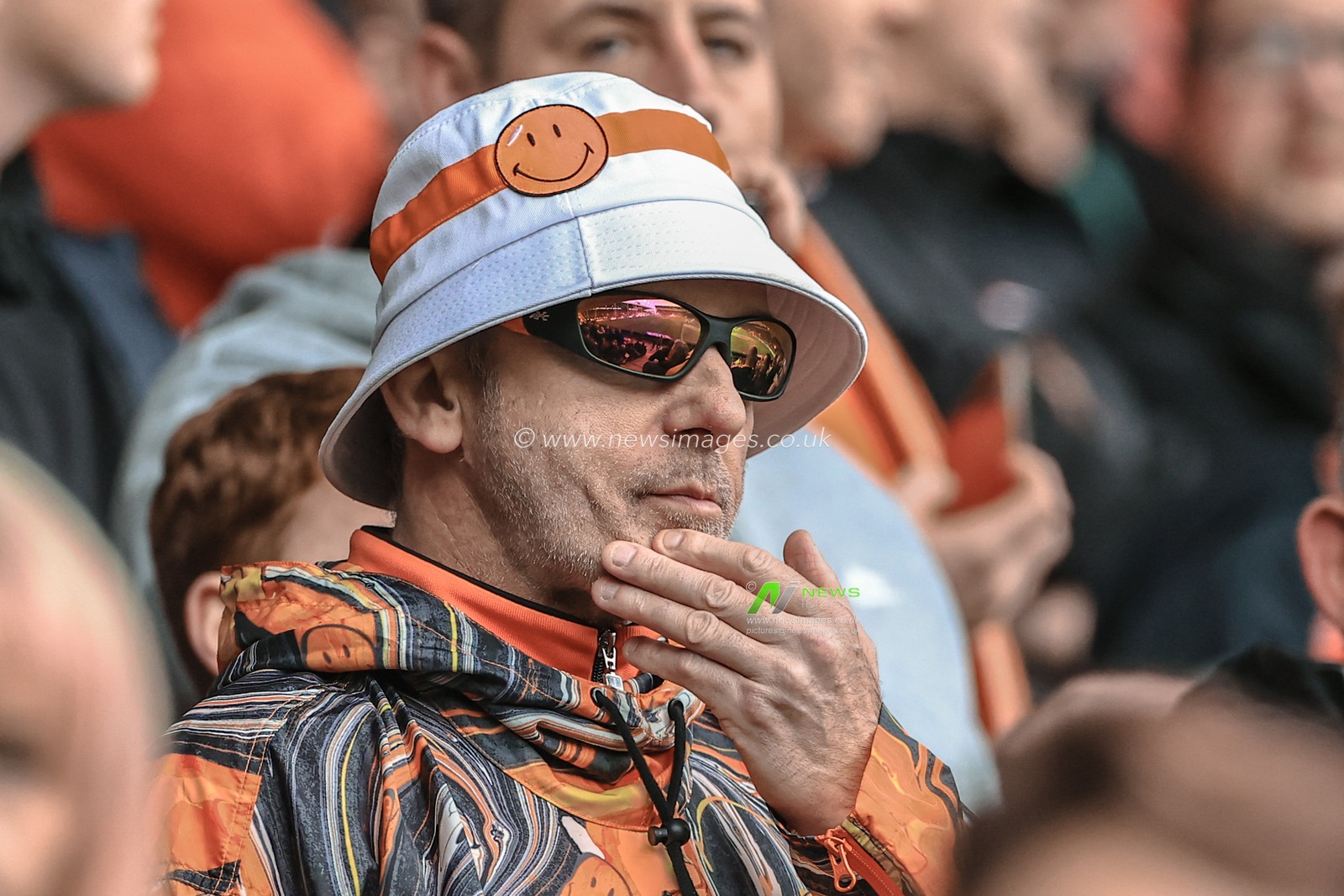 The reflection of Bloomfield Road through a fans sunglasses