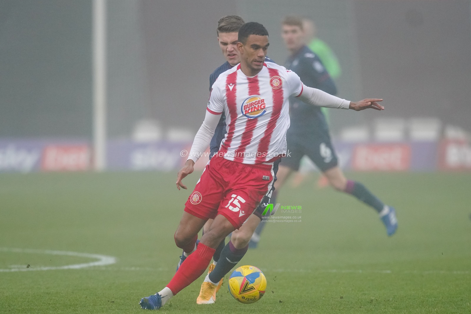 Terence Vancooten #15 of Stevenage battles Viktor Gyokeres #14 of Swansea City