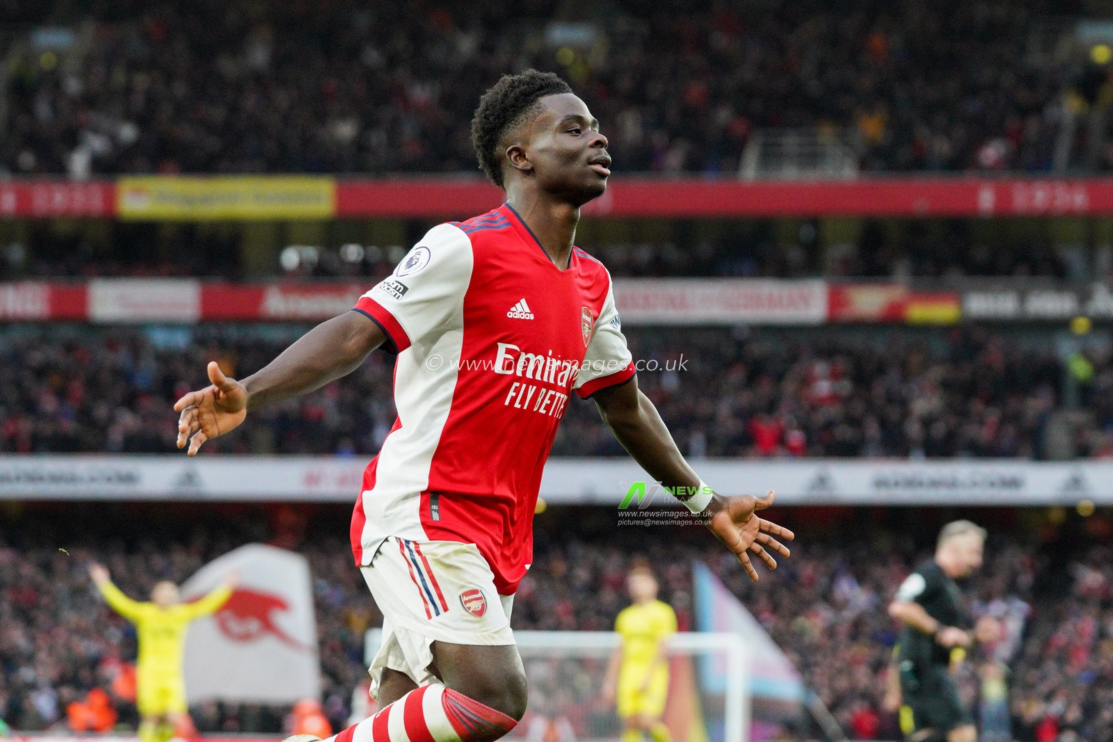 Bukayo Saka #7 of Arsenal celebrates after scoring second goal