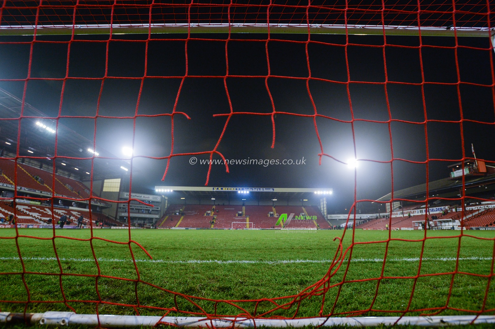 30th November 2019, Oakwell, Barnsley, England; Sky Bet Championship, Barnsley v Hull City : Damaged to the net caused by a Steward having to cut free entangled goalkeeper Sami Radlinger (1) of Barnsley FC.

Credit: Dean Williams/News Images