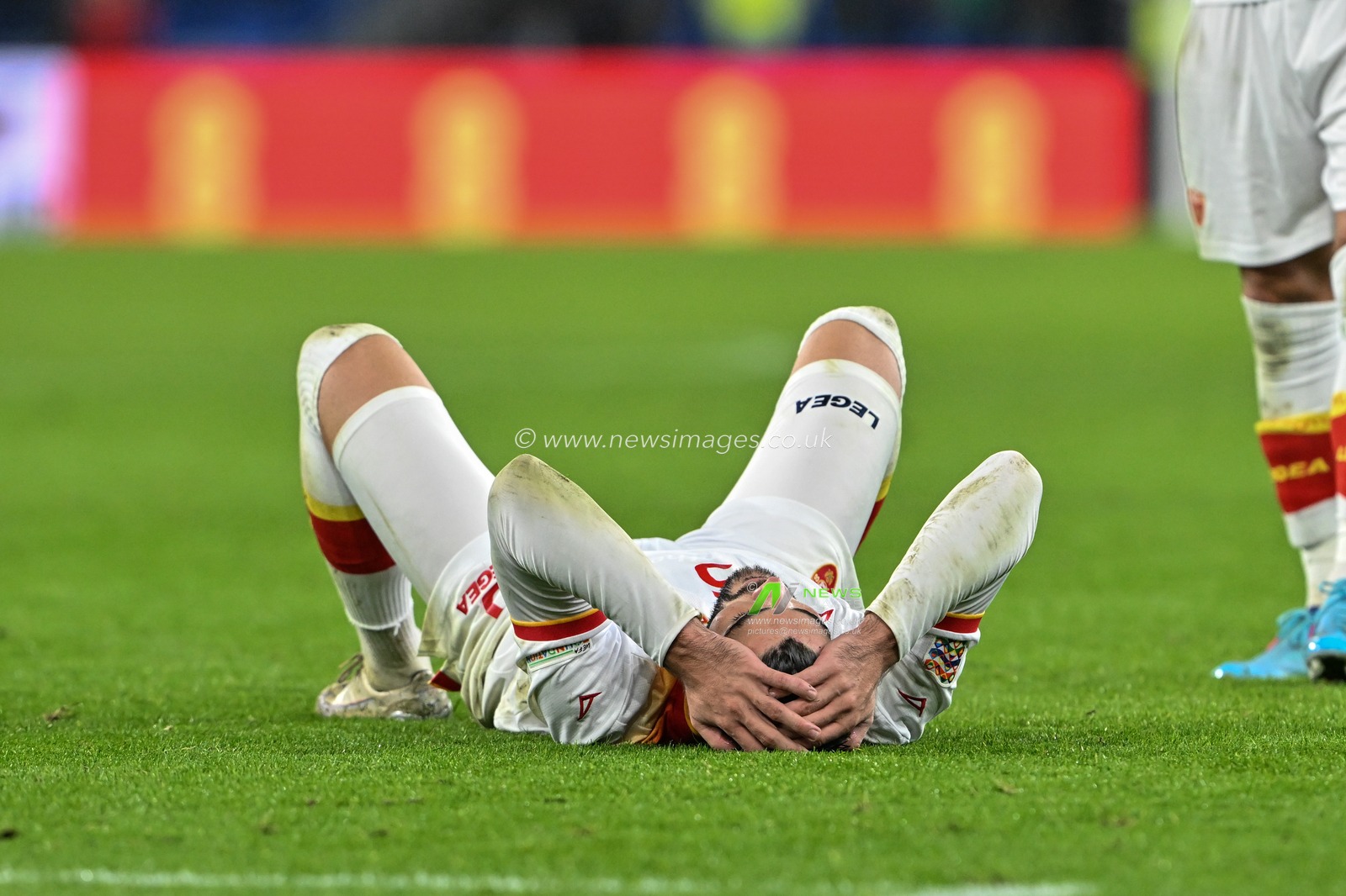 A dejected Igor VujaÄiÄ‡ of Montenegro on the floor after the full time whistle during the UEFA Nations League - League B - Group 4 match Wales vs Montenegro at Cardiff City Stadium, Cardiff, United Kingdom, 14th October 2024

(Photo by Cody Froggatt/News Images)