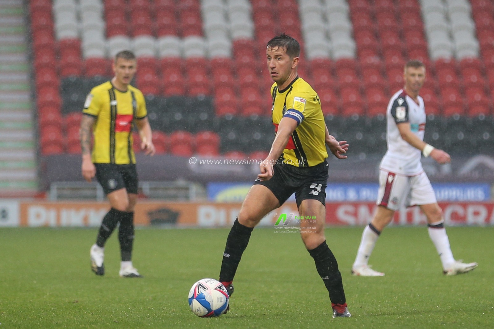 Josh Falkingham (4) of Harrogate Town in action during the game