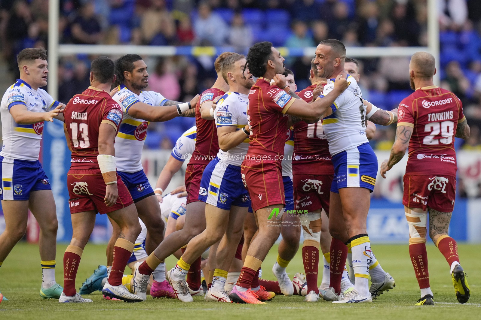 Paul Vaughan #10 of Warrington Wolves  and Tyrone May #6 of Catalans Dragons tussle after a high tackle on Matty Nicholson #12 of Warrington Wolves during the Betfred Super League Round 21 match Warrington Wolves vs Catalans Dragons at Halliwell Jones Stadium, Warrington, United Kingdom, 4th August 2023

(Photo by Steve Flynn/News Images)