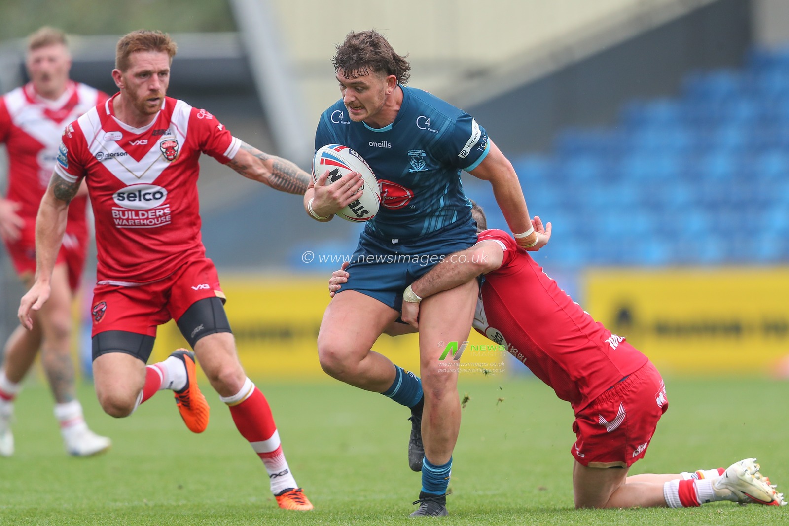 Jordy Crowther #36 of Warrington Wolves is tackled by Ryan Brierley #1 of Salford Red Devils during the Betfred Super League Round 25 match Salford Red Devils vs Warrington Wolves at AJ Bell Stadium, Eccles, United Kingdom, 10th September 2023

(Photo by Gareth Evans/News Images)
