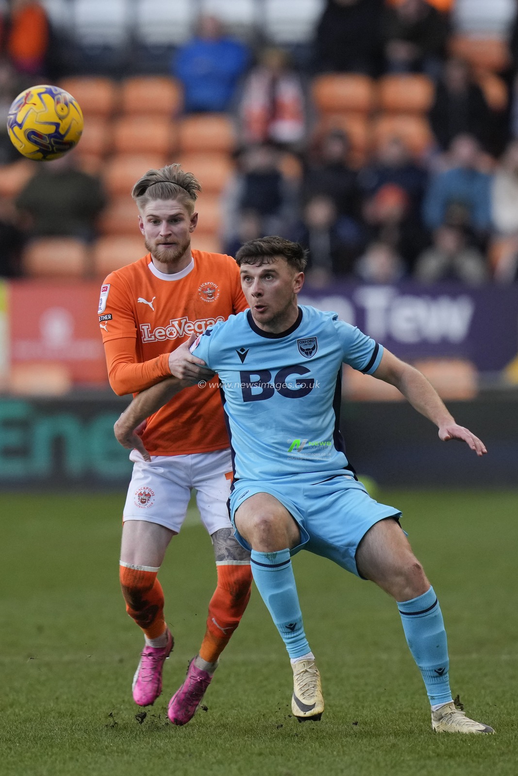 Hayden Coulson of Blackpool competes for the ball with Mark Harris of Oxford United during the Sky Bet League 1 match Blackpool vs Oxford United at Bloomfield Road, Blackpool, United Kingdom, 10th February 2024

(Photo by Steve Flynn/News Images)