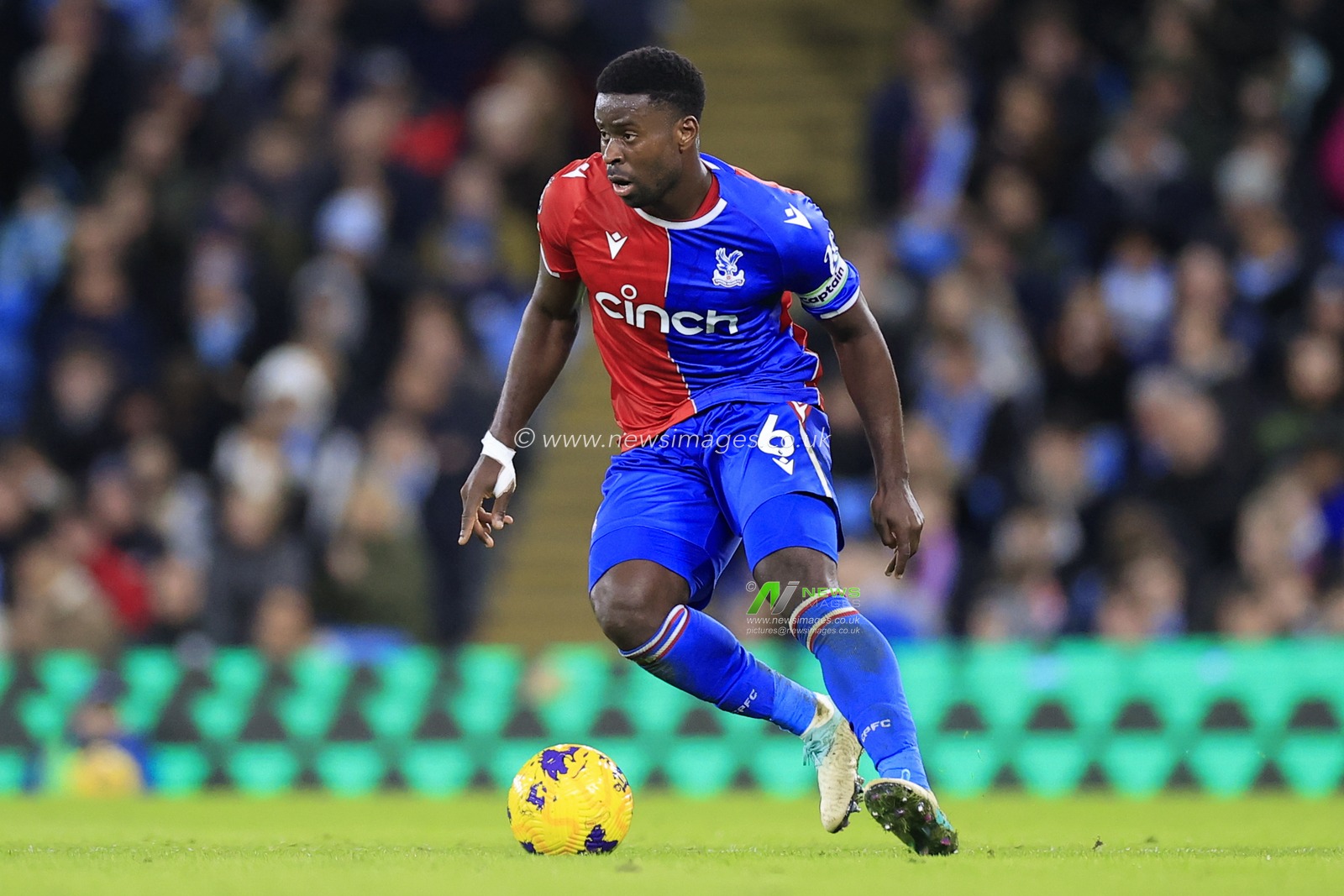 Marc Guehi #6 of Crystal Palace controls the ball during the Premier League match Manchester City vs Crystal Palace at Etihad Stadium, Manchester, United Kingdom, 16th December 2023

(Photo by Conor Molloy/News Images)