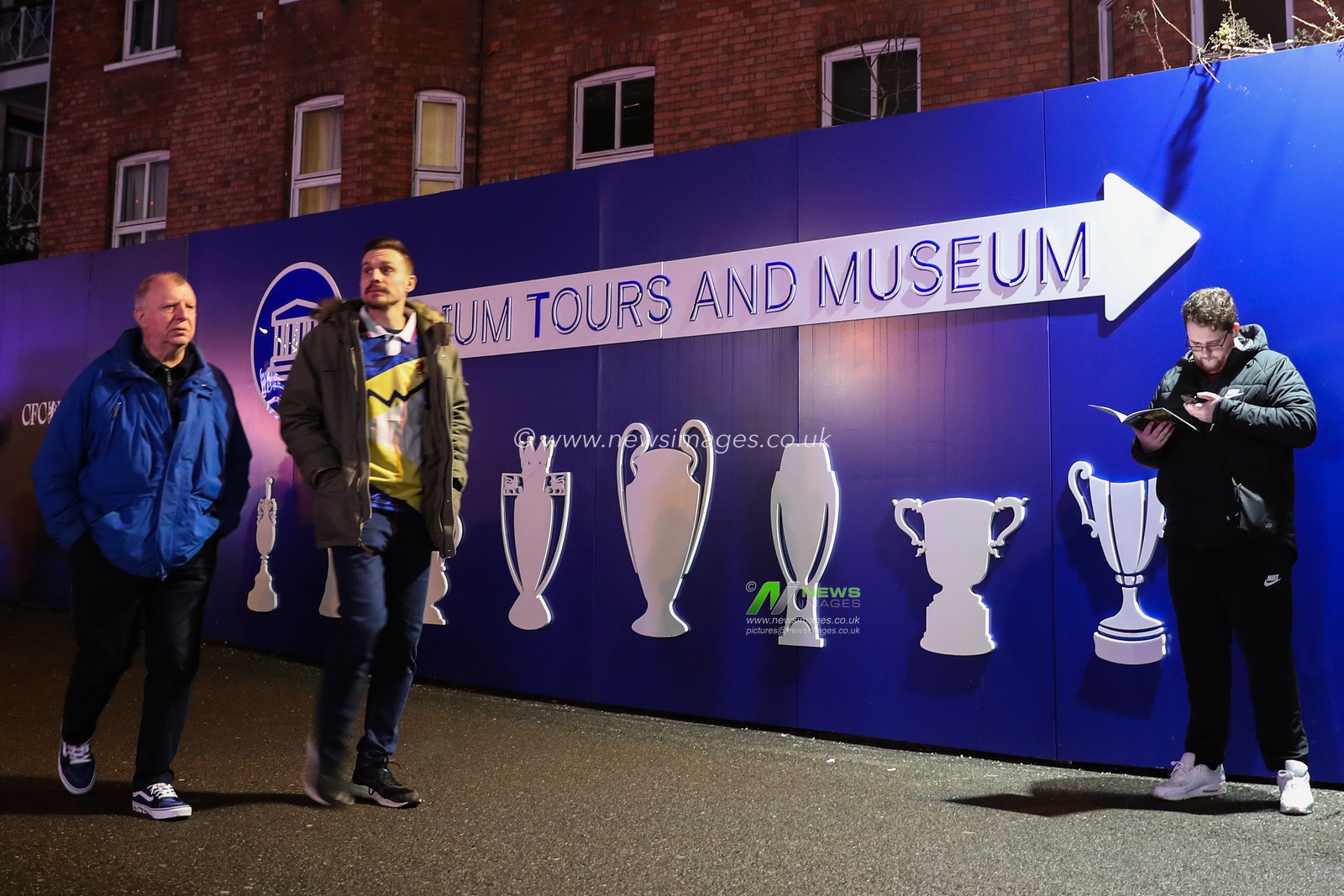A fan reads the match day programme ahead of the Premier League match Chelsea vs Bournemouth at Stamford Bridge, London, United Kingdom, 14th January 2025

(Photo by Gareth Evans/News Images)