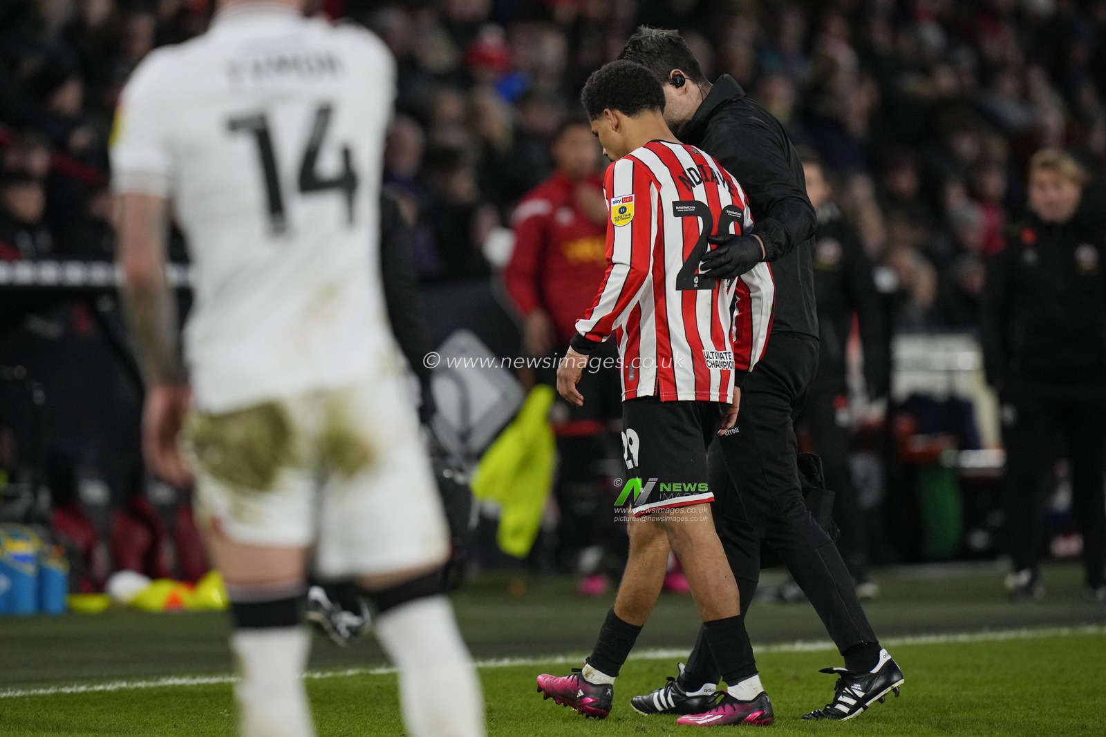 Iliman Ndiaye #29 of Sheffield United is helped from the field by a medic during the Sky Bet Championship match Sheffield United vs Stoke City at Bramall Lane, Sheffield, United Kingdom, 14th January 2023

(Photo by Steve Flynn/News Images)