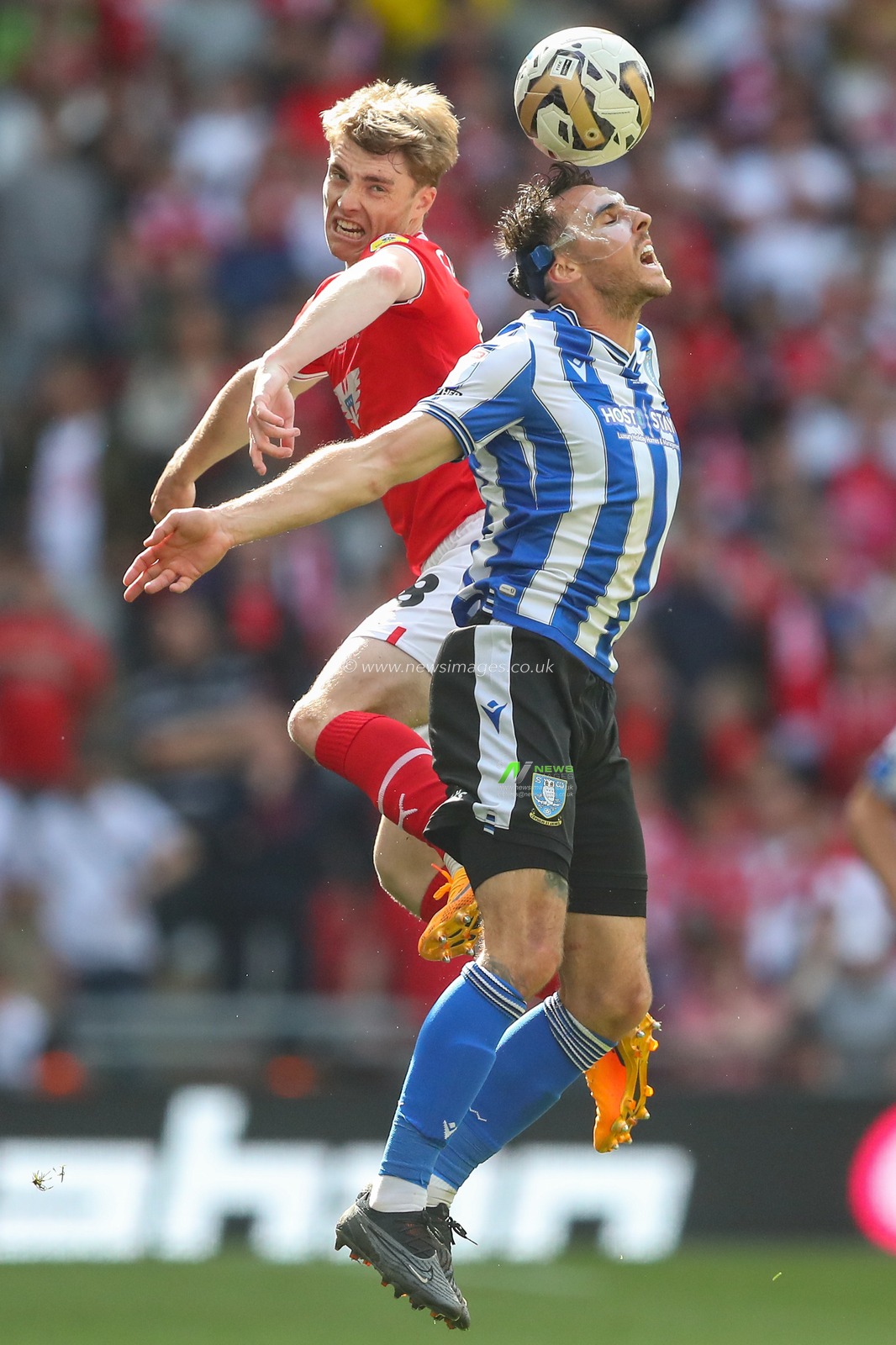 Luca Connell #48 of Barnsley  and Lee Gregory #9 of Sheffield Wednesday  battle for the ball during the Sky Bet League 1 Play-off Final match Barnsley vs Sheffield Wednesday at Wembley Stadium, London, United Kingdom, 29th May 2023

(Photo by Gareth Evans/News Images)