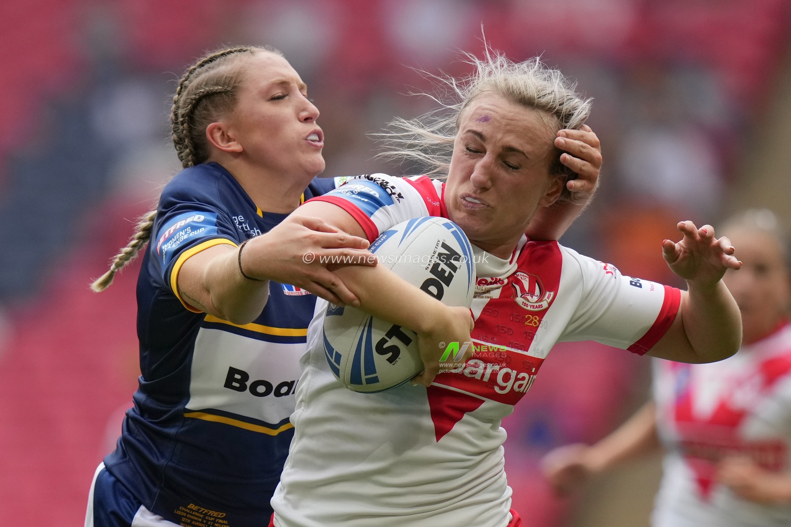 Caitlin Beevers #3 of Leeds Rhinos tackles Jodie Cunningham #13 of St. Helens during the Betfred Womens Challenge Cup Final match Leeds Rhinos vs St Helens at Wembley Stadium, London, United Kingdom, 12th August 2023

(Photo by Steve Flynn/News Images)