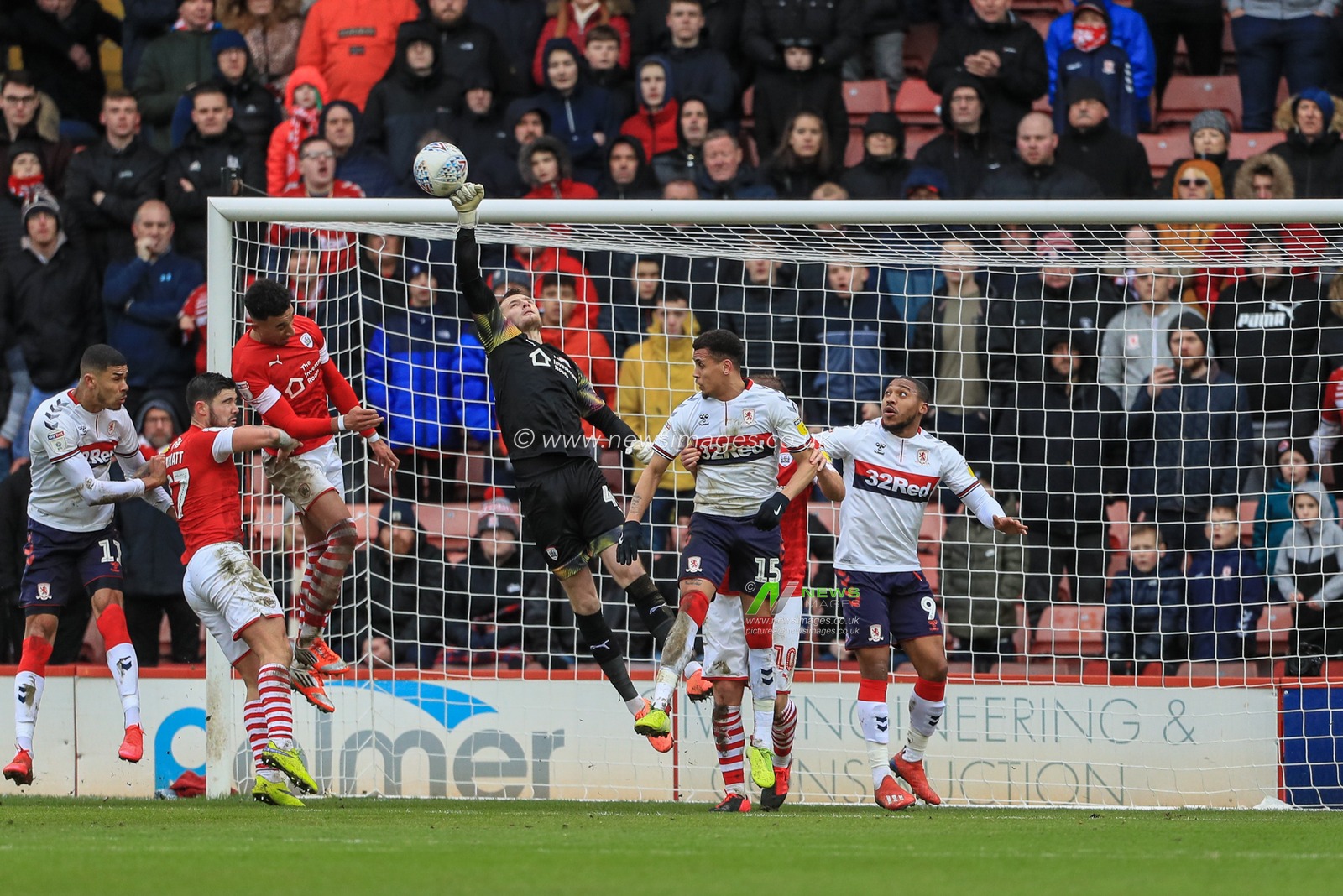 22nd February 2020, Oakwell, Barnsley, England; Sky Bet Championship, Barnsley v Middlesbrough :Brad Collins (40) of Barnsley makes a fingertip save