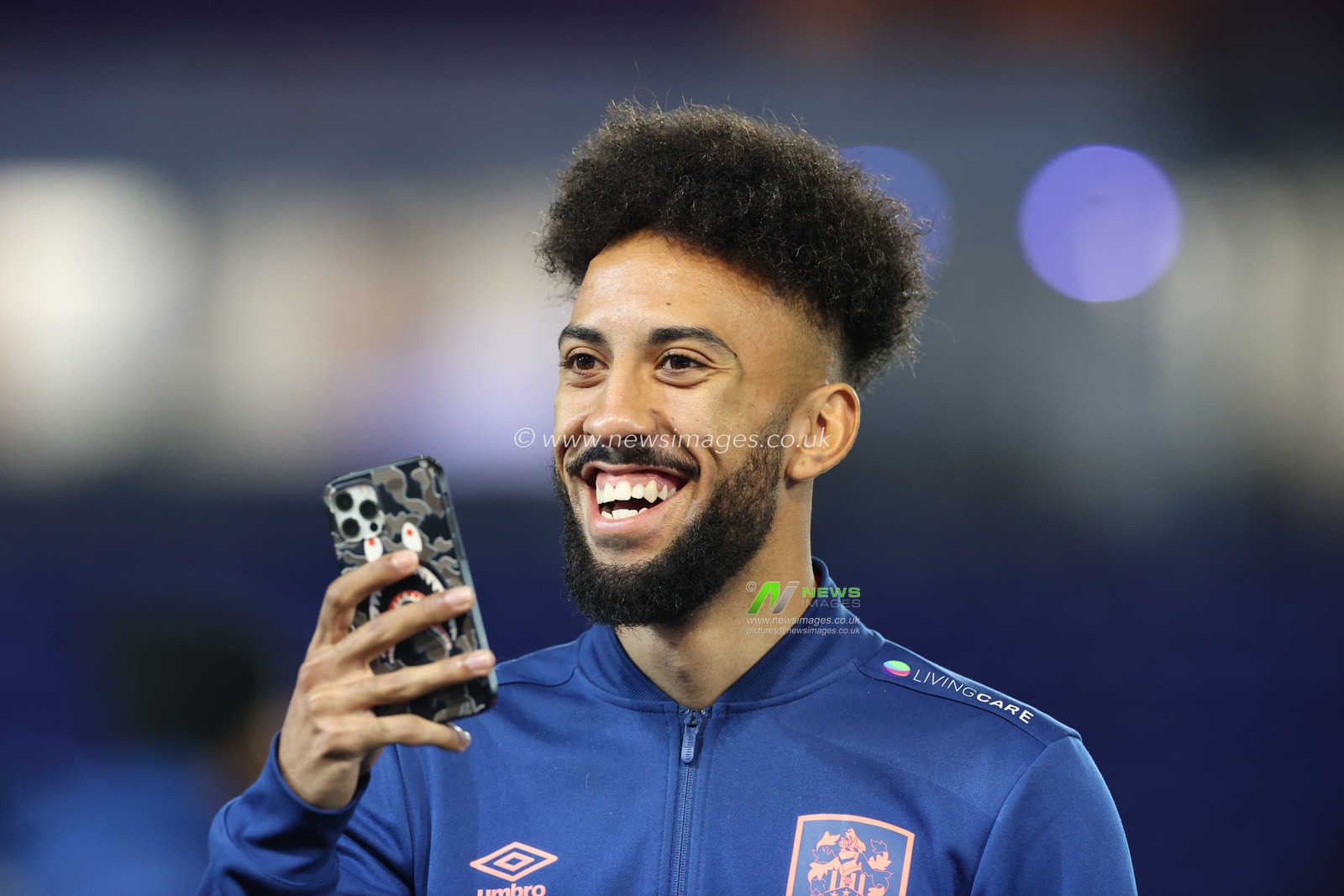 Sorba Thomas #16 of Huddersfield Town arrives at the Weston Homes Stadium