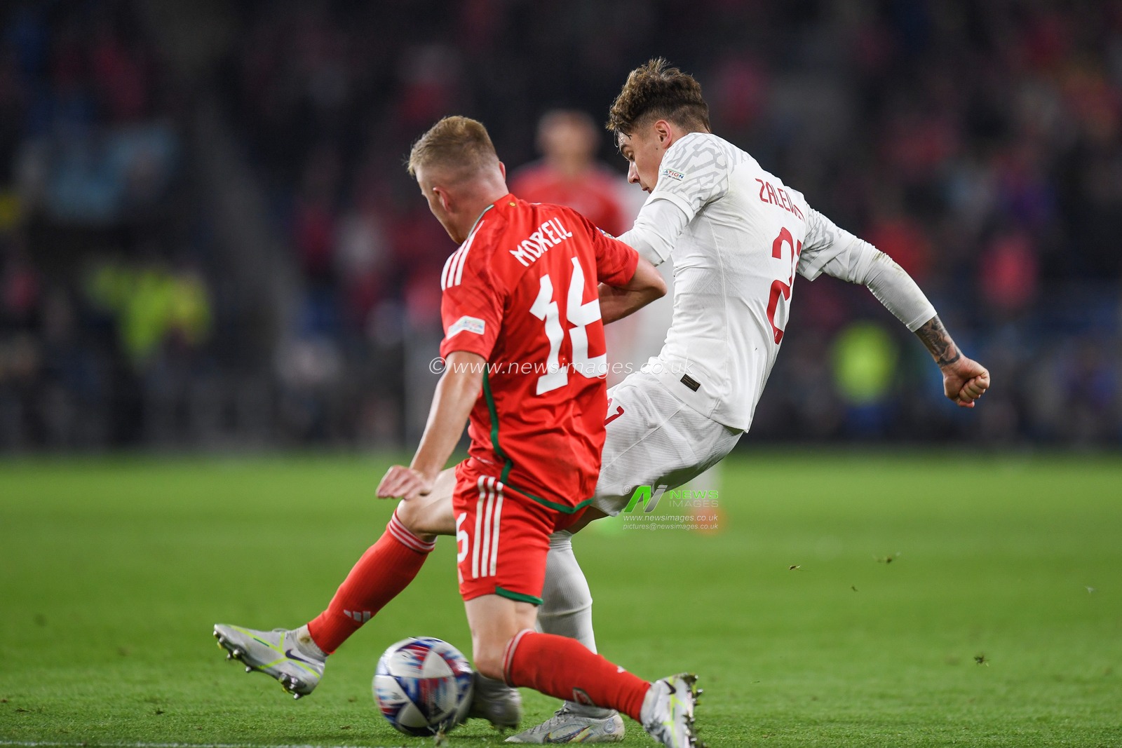 Poland's Nicola Zalewski Under pressure from Joe Morrell of Wales during the UEFA Nations League Group A4 match between Wales vs Poland at Cardiff City Stadium, Cardiff, United Kingdom, 25th September 2022

(Photo by Mike Jones/News Images)