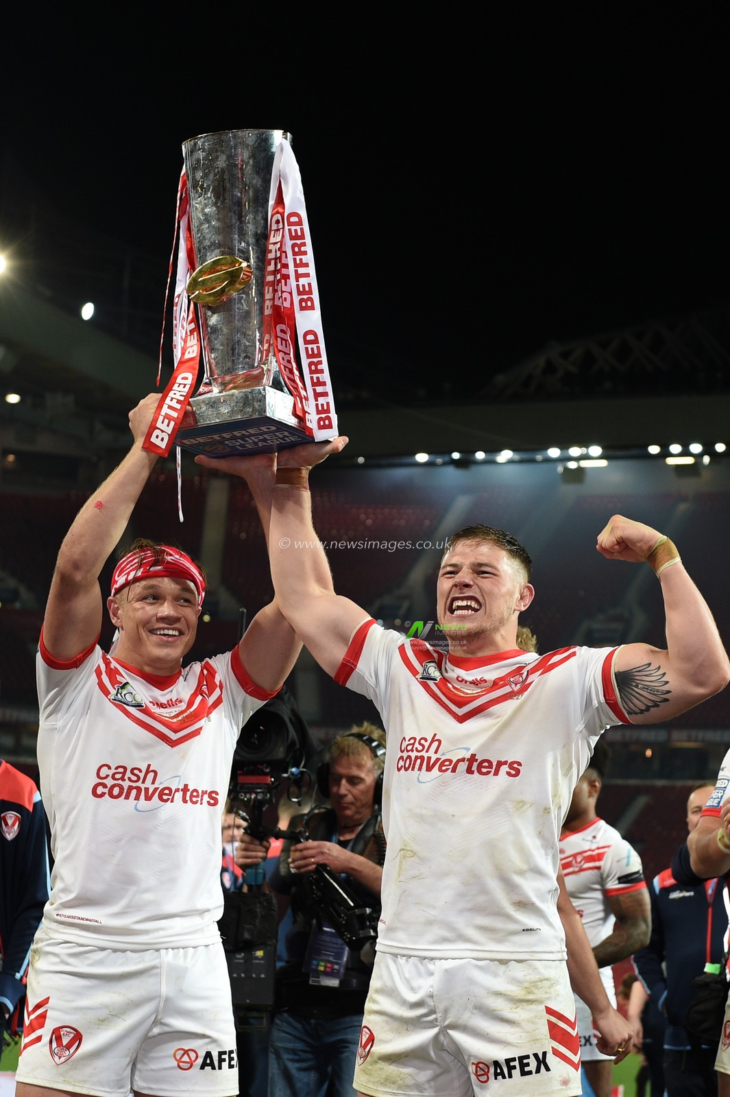 12th October 2019, Old Trafford, Manchester, England; The Grand Final 2019, Saint Helens v Salford Red Devils : Jonny Lomax (1) of Saint Helens and Morgan Knowles (15) of Saint Helens celebrate in front of fans

Credit: Richard Long/News Images