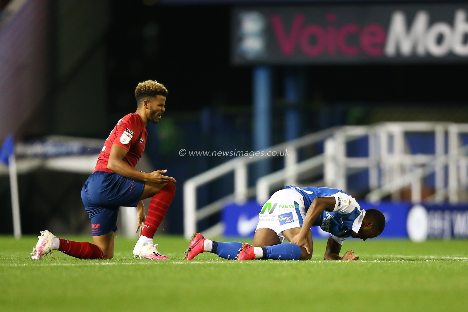 Jeremie Bela (11) of Birmingham City is fouled by Fraizer Campbell (22) of Huddersfield Town