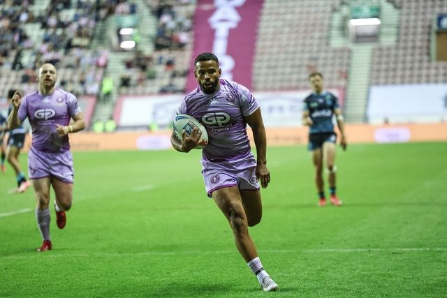 ï»¿ï»¿Kruise Leeming of Wigan Warriors goes over for a try during the Betfred Super League Round 11 match Wigan Warriors vs Leigh Leopards at The Brick Community Stadium, Wigan, United Kingdom, 16th May 2025

(Photo by Mark Cosgrove/News Images)