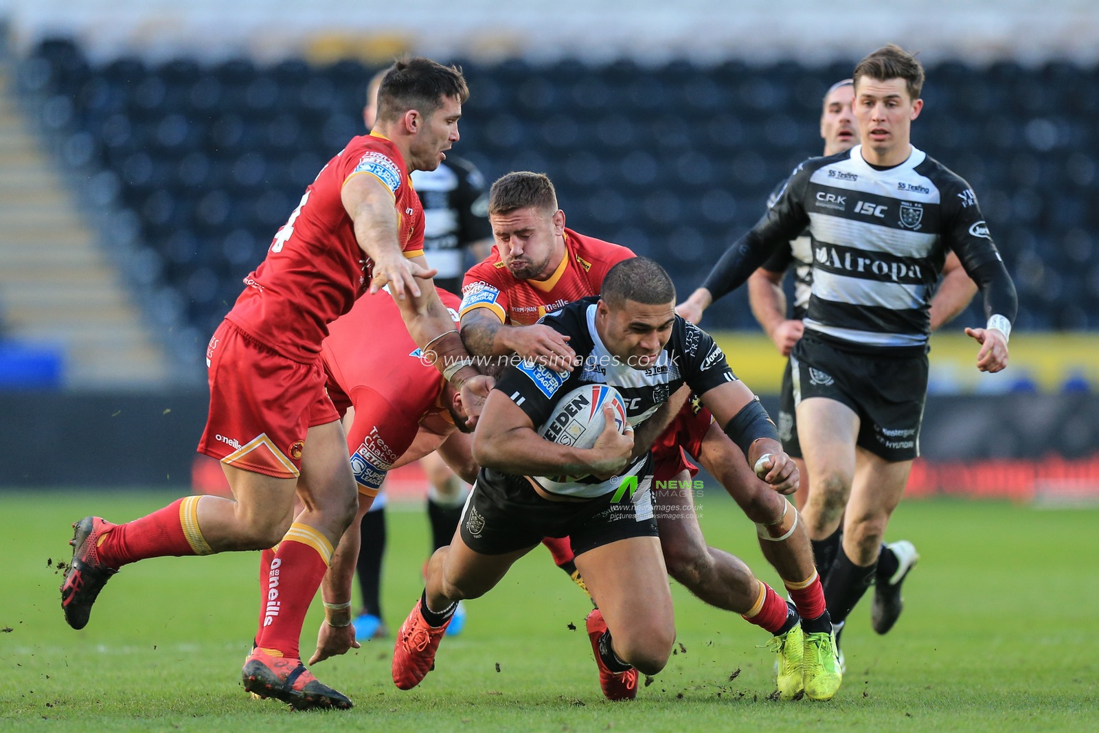 1st March 2020, KCOM Stadium, Hull, England; Betfred Super League, Hull FC v Catalans Dragons : Tevita Satae (10) of Hull FC is tackled by Michael McIlorum (9) of Catalans Dragons
