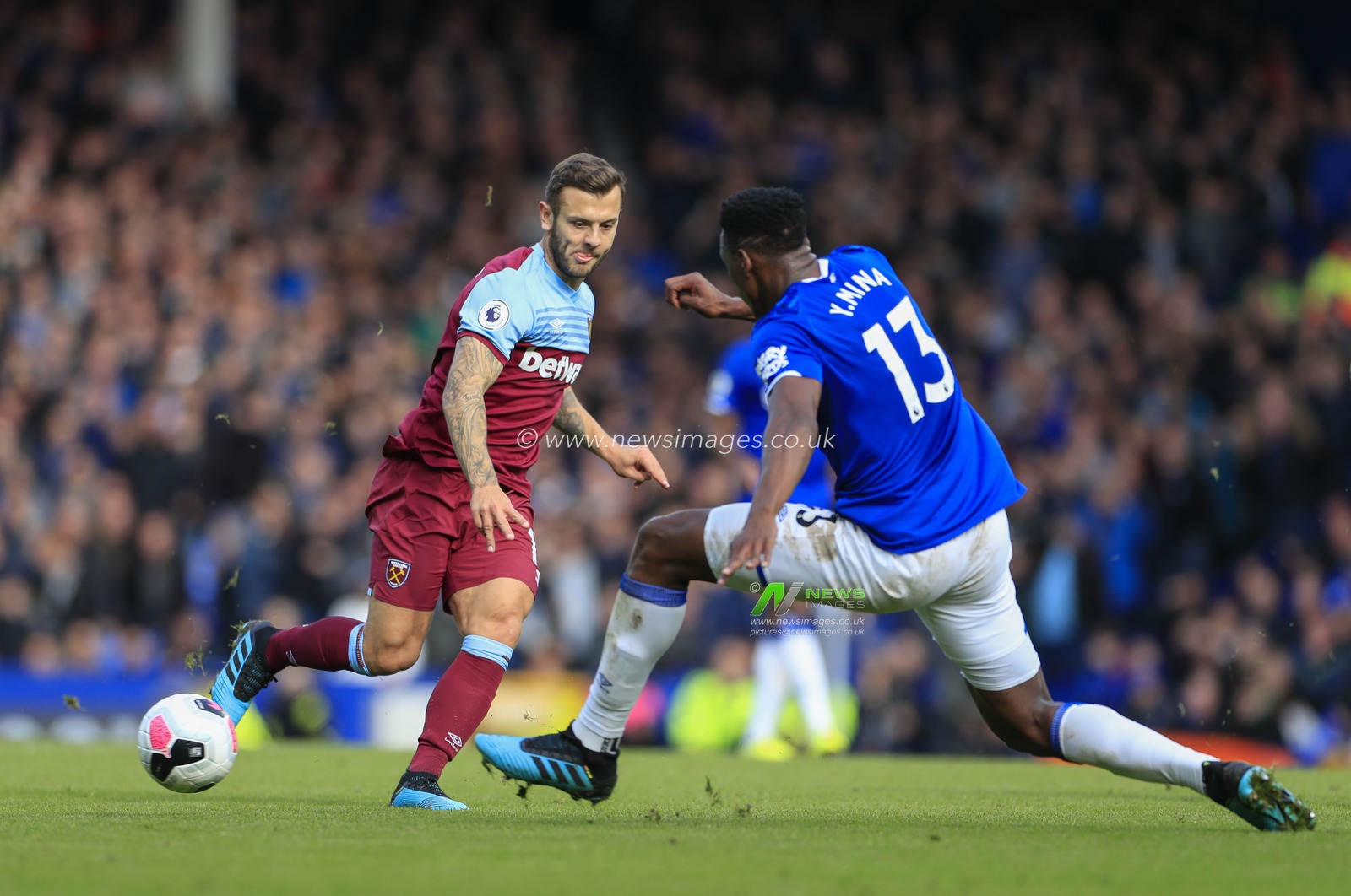 19th October 2019, Goodison Park, Liverpool, England; Premier League, Everton v West Ham United : Jack Wilshire (19) of West Ham United passes the ball beyond Yerry Mina (13) of Everton

Credit: Conor Molloy/News Images