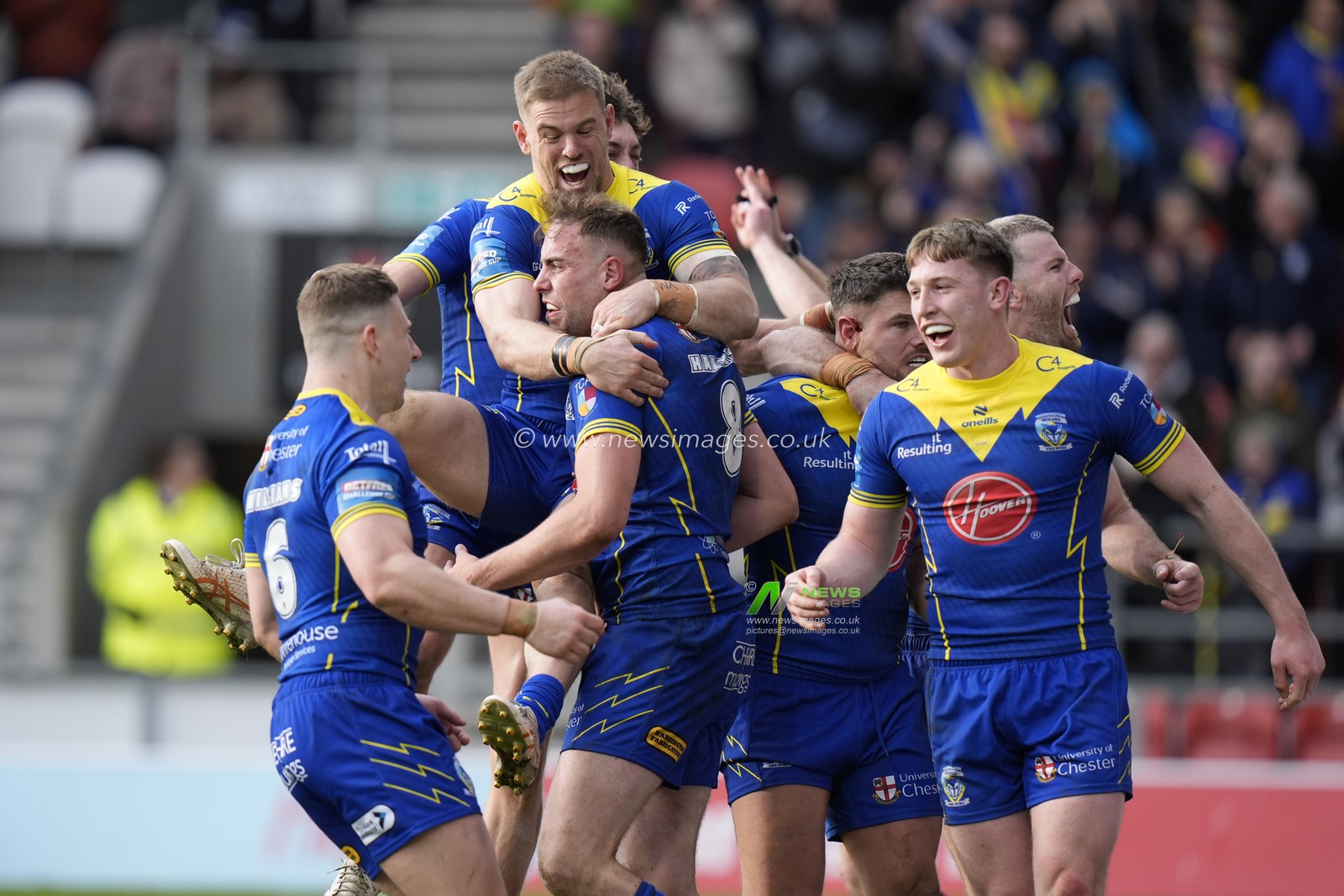 Matt Dufty of Warrington Wolves celebrates with try scorer James Harrison of Warrington Wolves during the Betfred Challenge Cup Quarter Final match St Helens vs Warrington Wolves at Totally Wicked Stadium, St Helens, United Kingdom, 14th April 2024

(Photo by Steve Flynn/News Images)