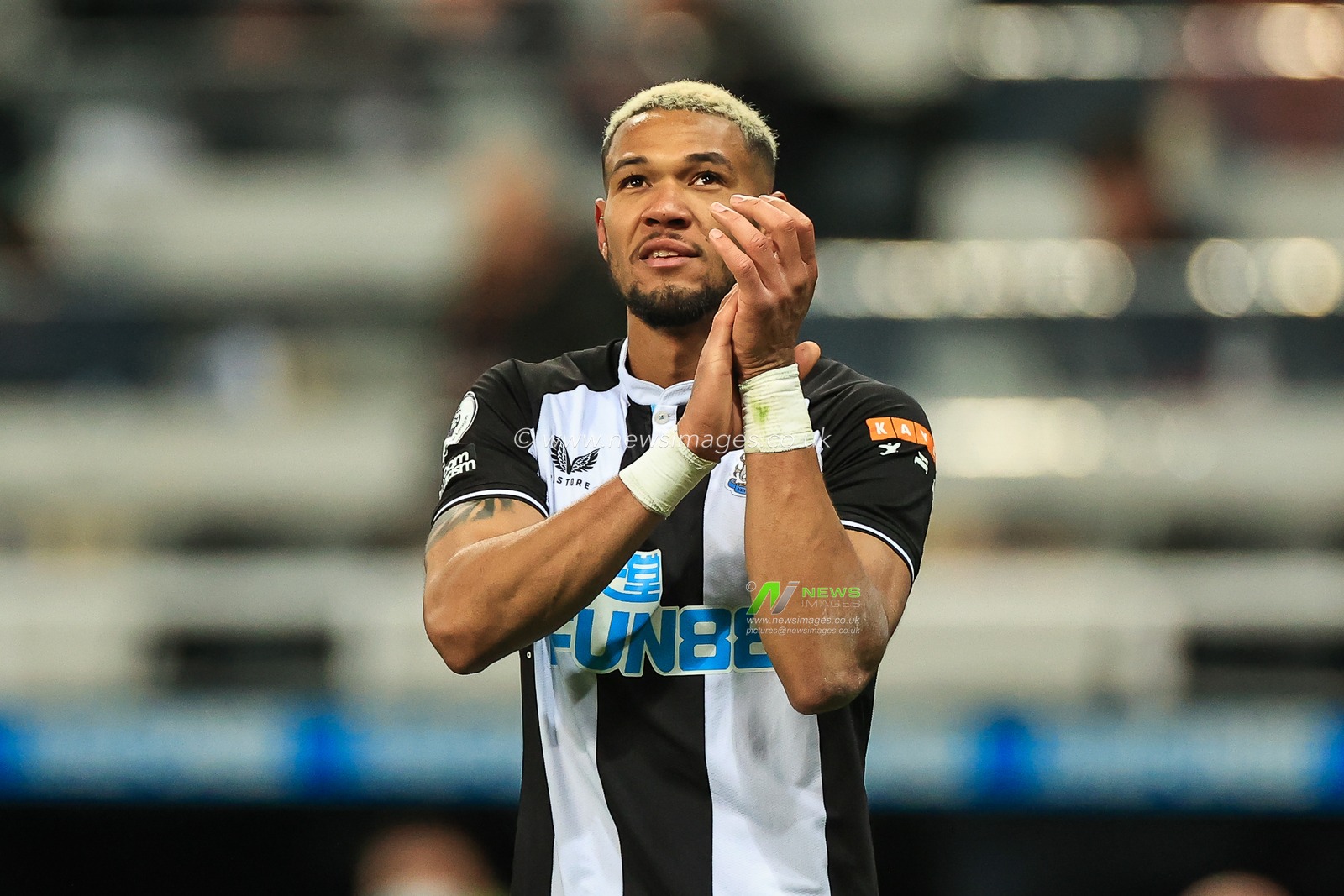 Joelinton #7 of Newcastle United applauds the fans at the end of the game