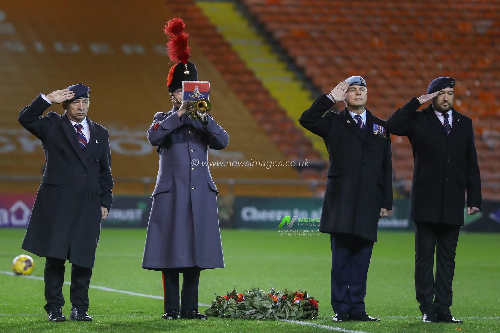 A member of the armed forces plays the last past during the Bristol Street Motors Trophy match Blackpool vs Morecambe at Bloomfield Road, Blackpool, United Kingdom, 14th November 2023

(Photo by Gareth Evans/News Images)