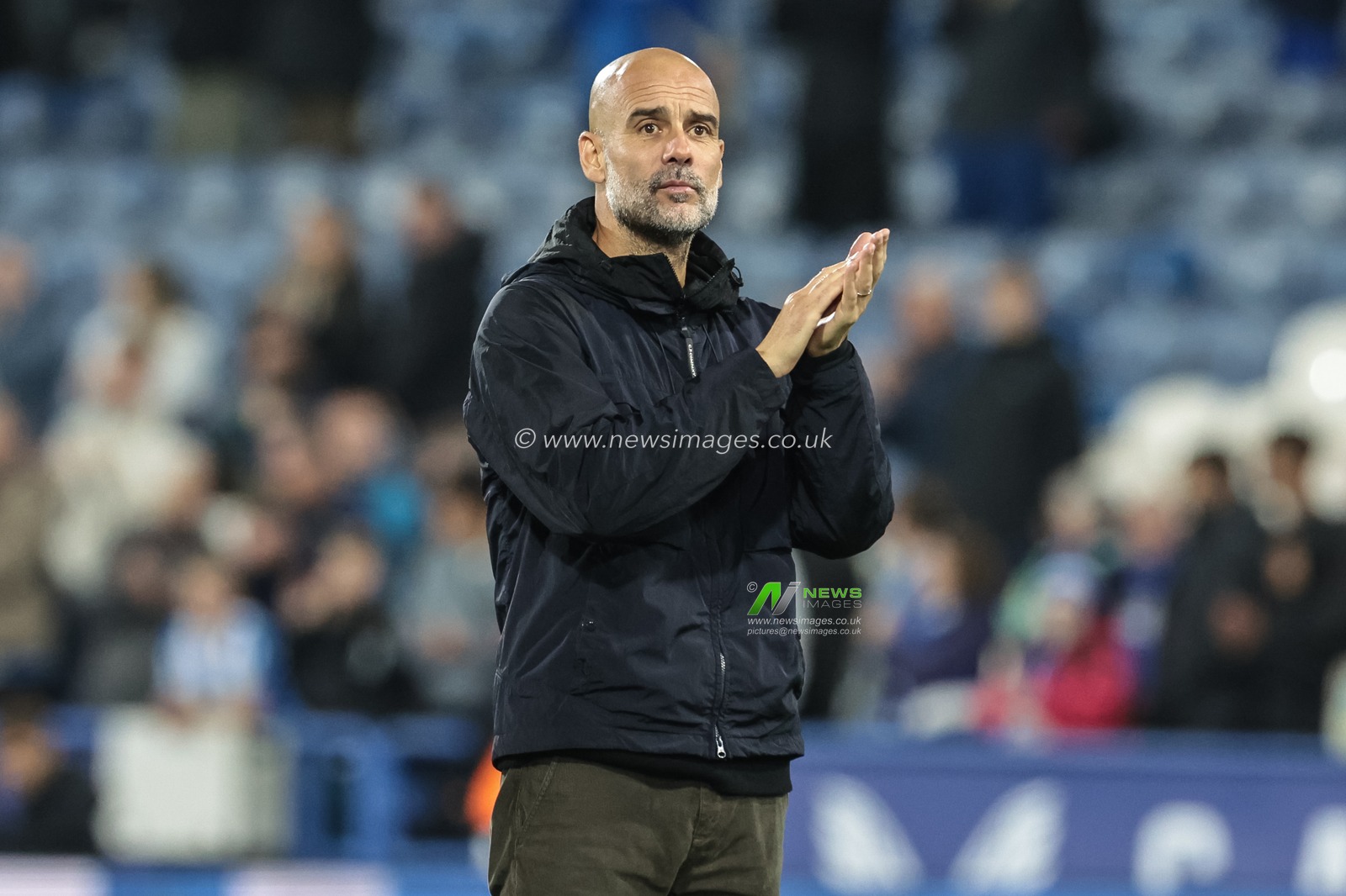 Pep Guardiola manager of Manchester City applauds the fans after the final whistle during the Carabao Cup Round 3 match Huddersfield Town vs Manchester City at Accu Stadium, Huddersfield, United Kingdom, 24th September 2025

(Photo by Mark Cosgrove/News Images)